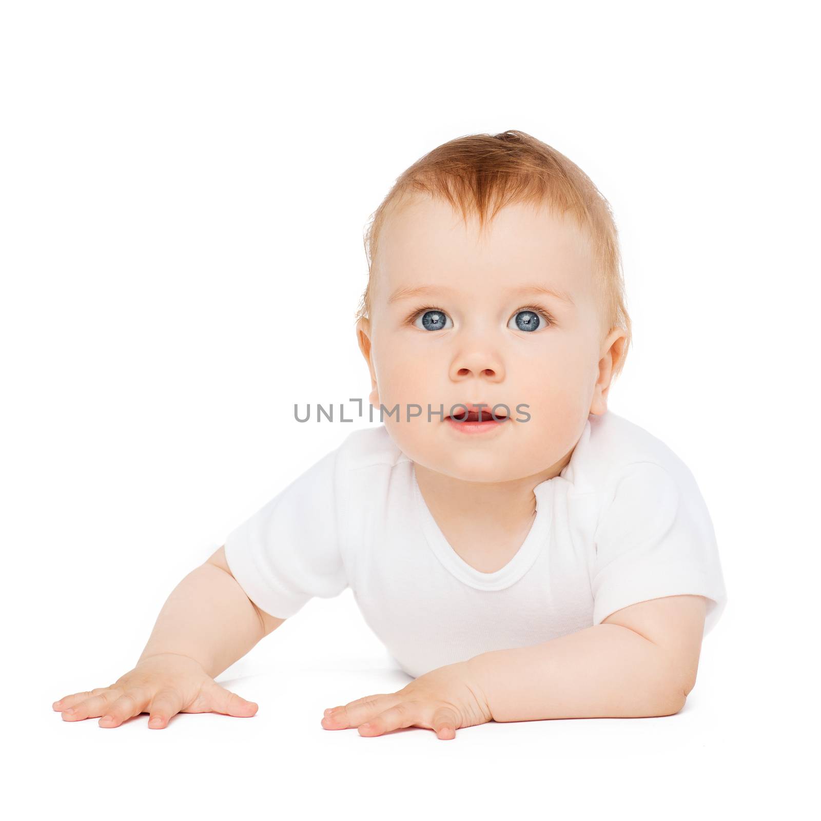 smiling baby lying on floor and looking up by dolgachov