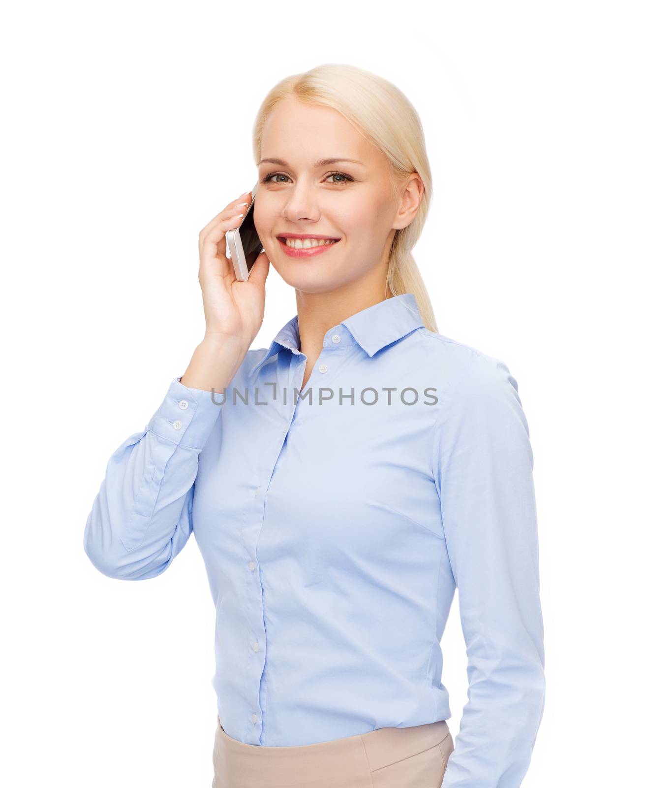 young smiling businesswoman with smartphone by dolgachov