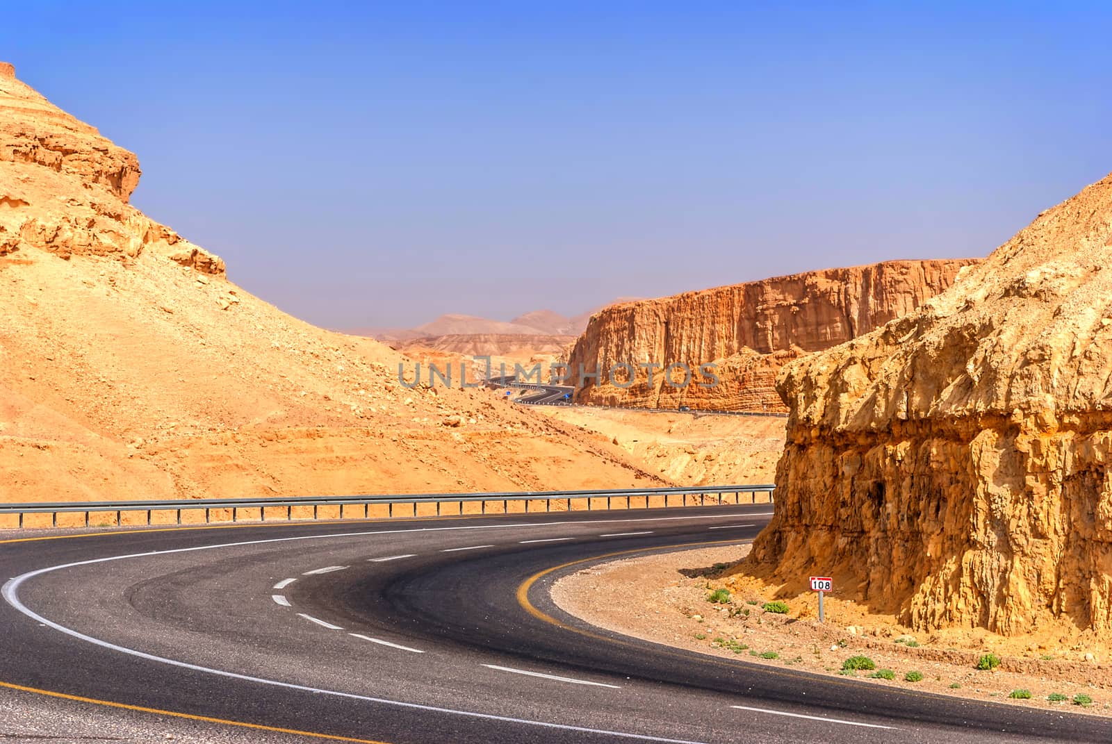 Asphalt road in the desert of Israel on the way to Dead Sea