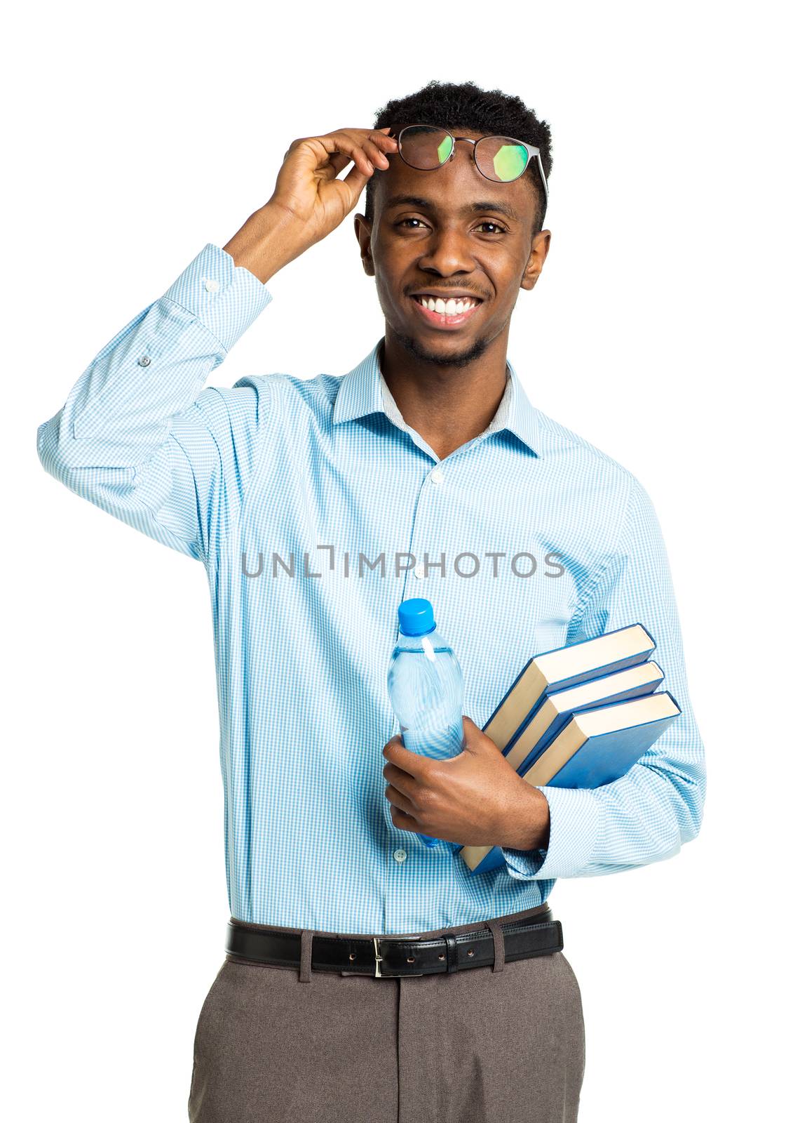 Happy african american college student with books and bottle of  by vlad_star