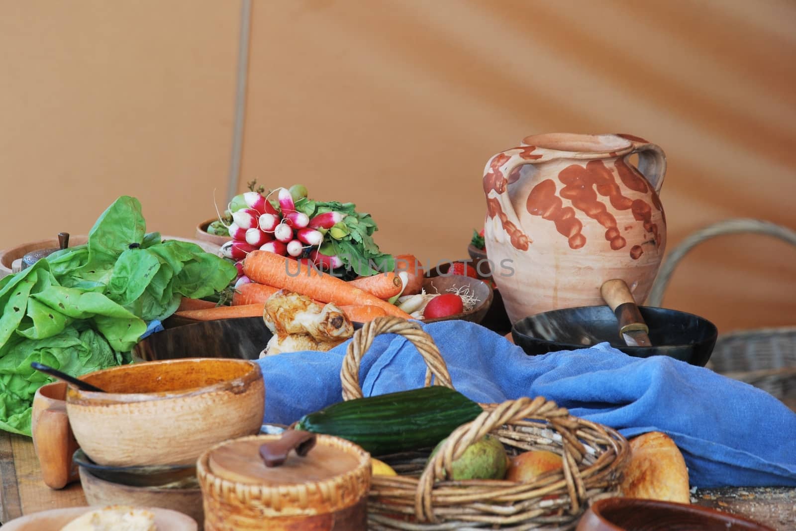 Rustic vegetables with clay jug