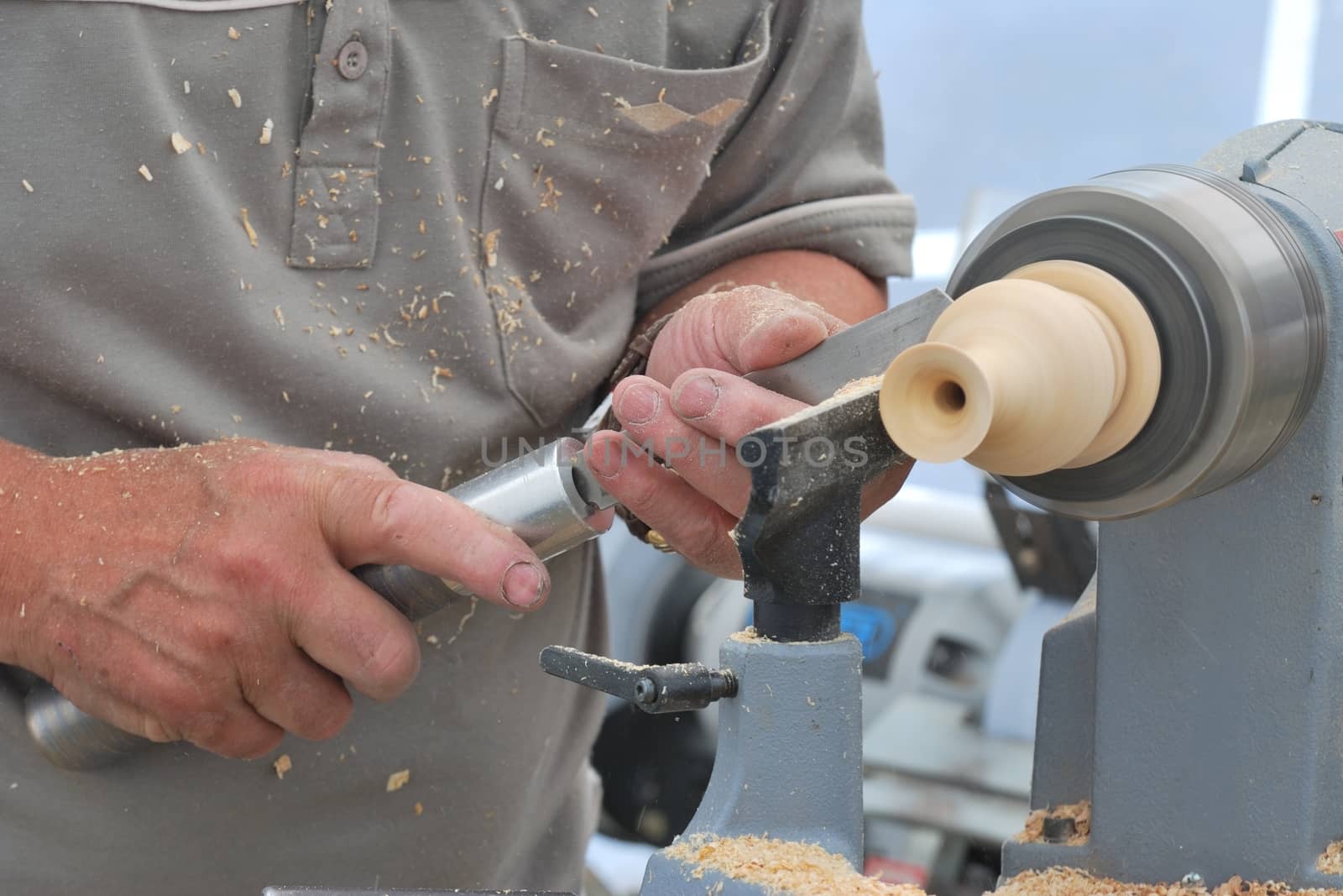 working at small wood lathe by pauws99