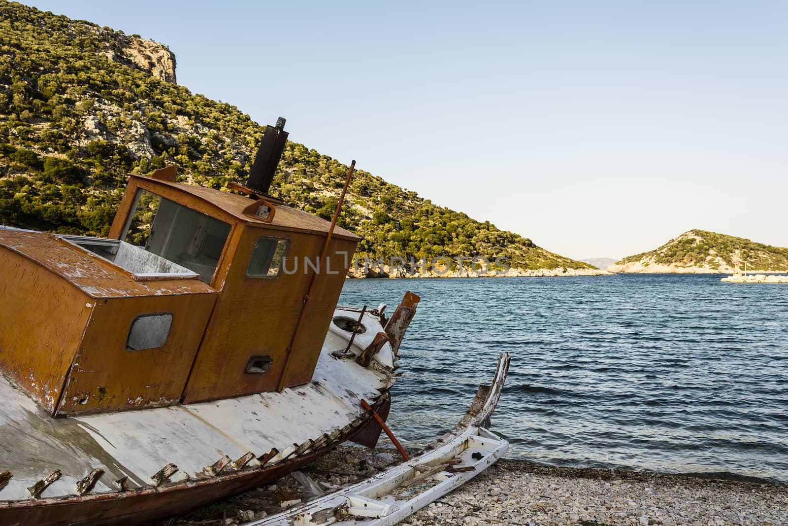 Abandoned fishing trawler on beach at Alonissos, Greece