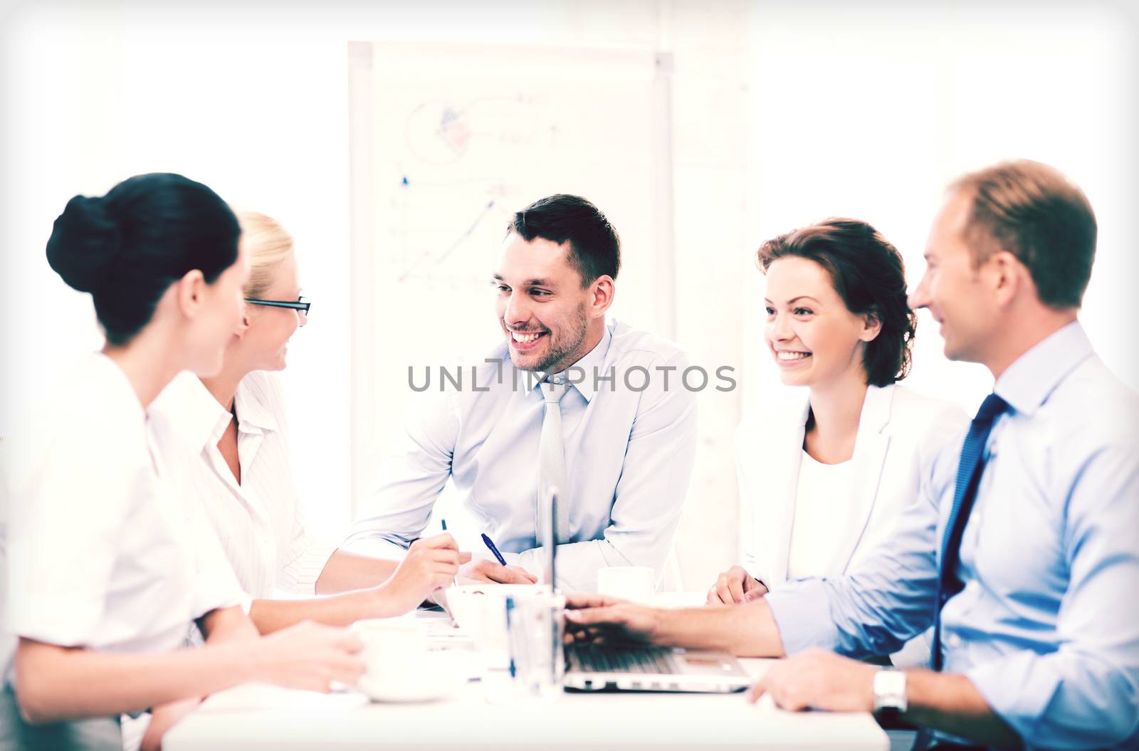business concept - business team having meeting in office