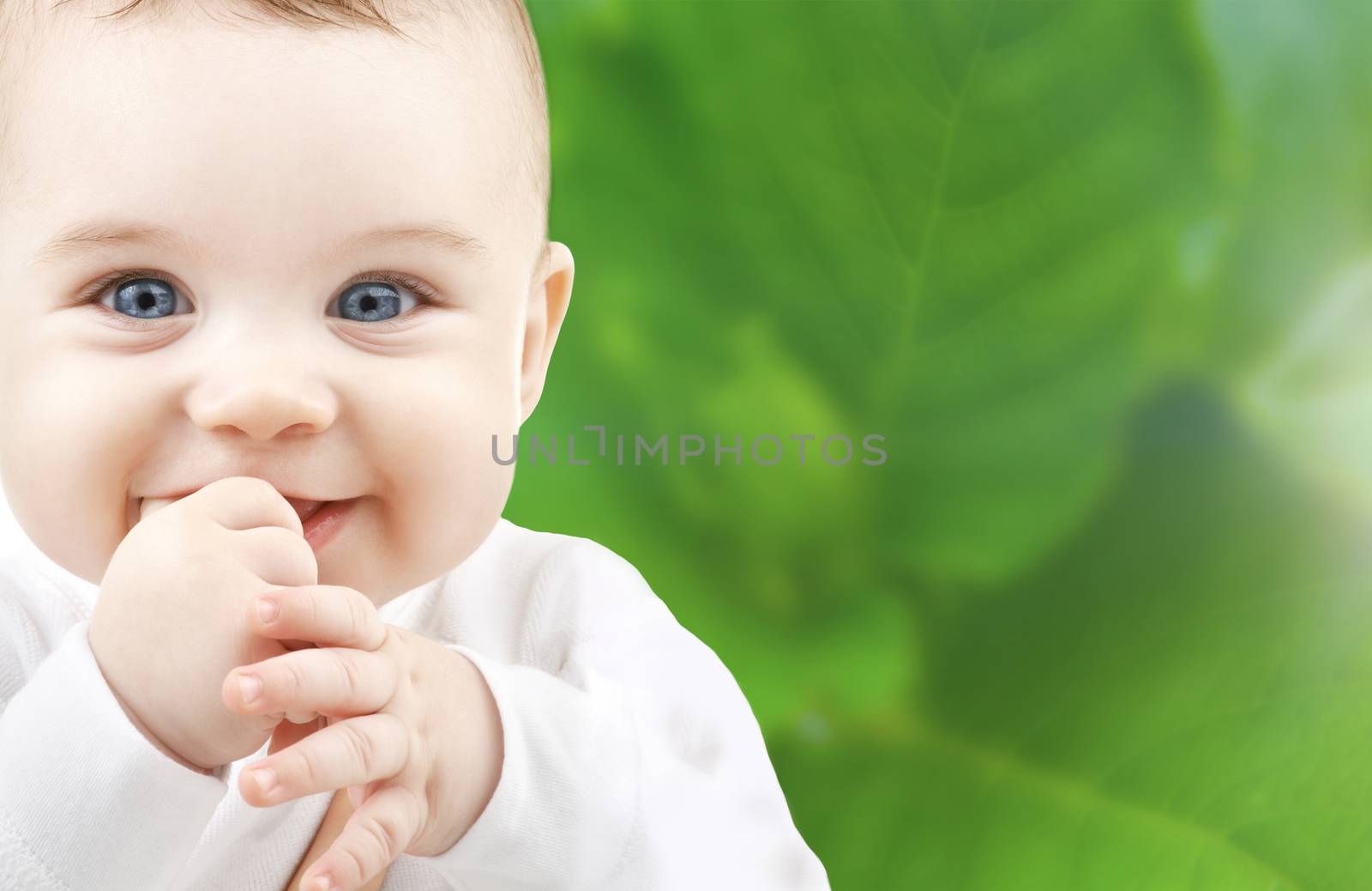 child, happiness and people concept - adorable baby