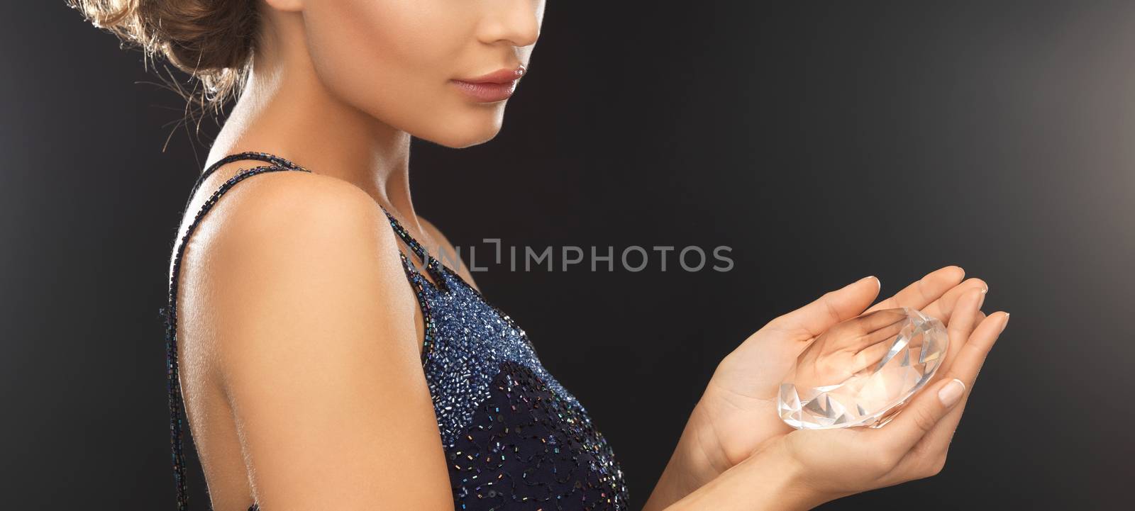 woman with big diamond by dolgachov