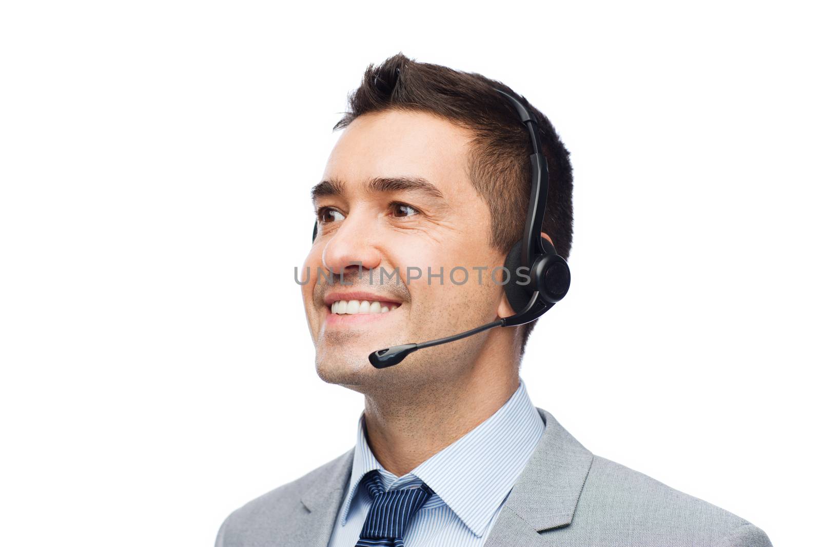 business, people, technology and service concept - smiling businessman in headset