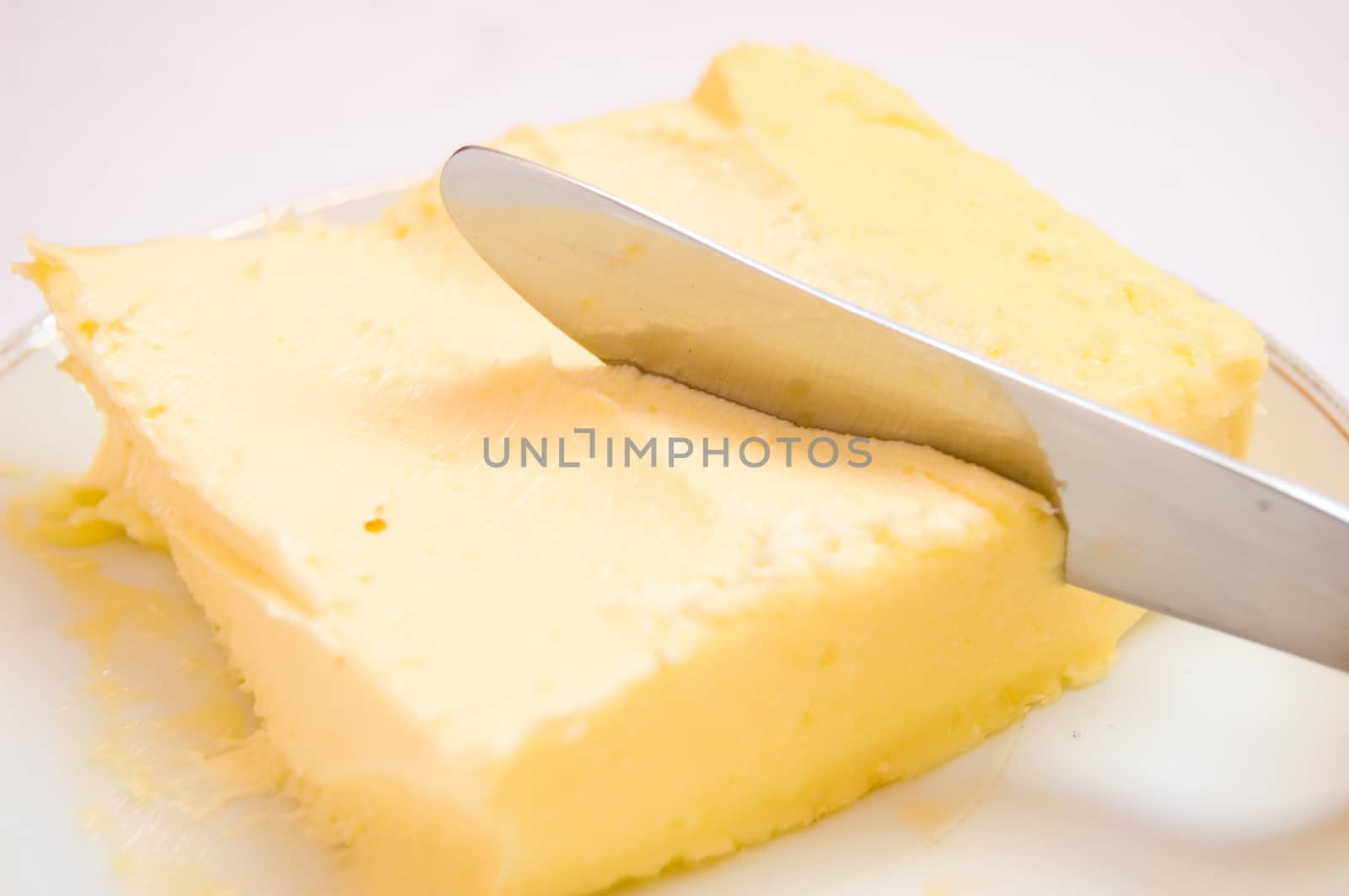 Food conceptual image. Butter on isolated background.