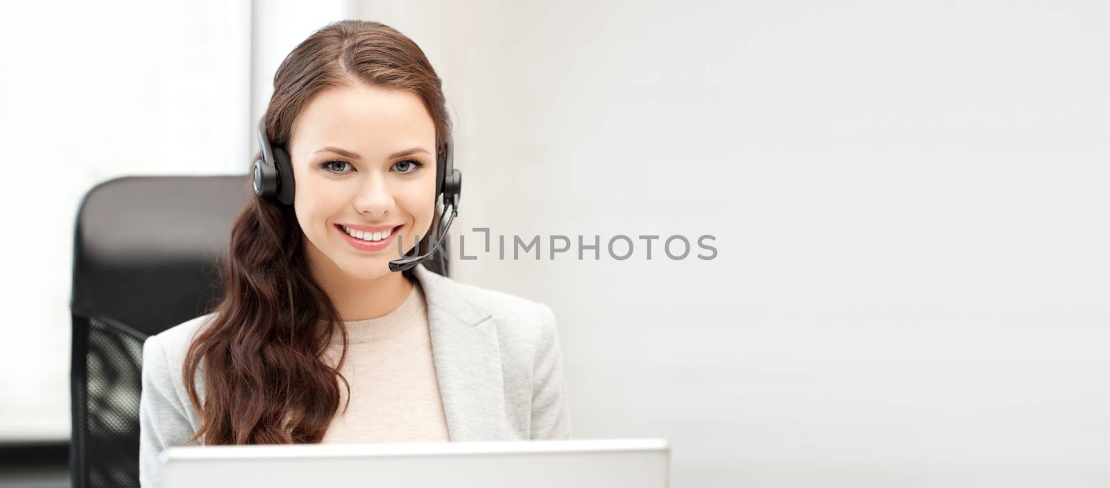 office and technology concept - picture of helpline operator with laptop computer