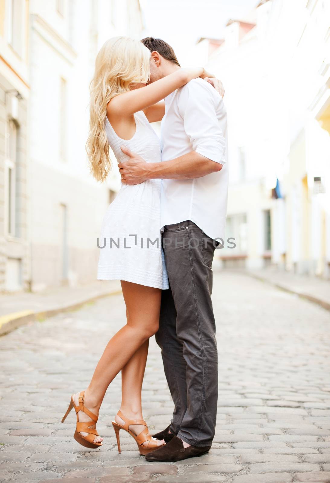 summer holidays and dating concept - couple in the city