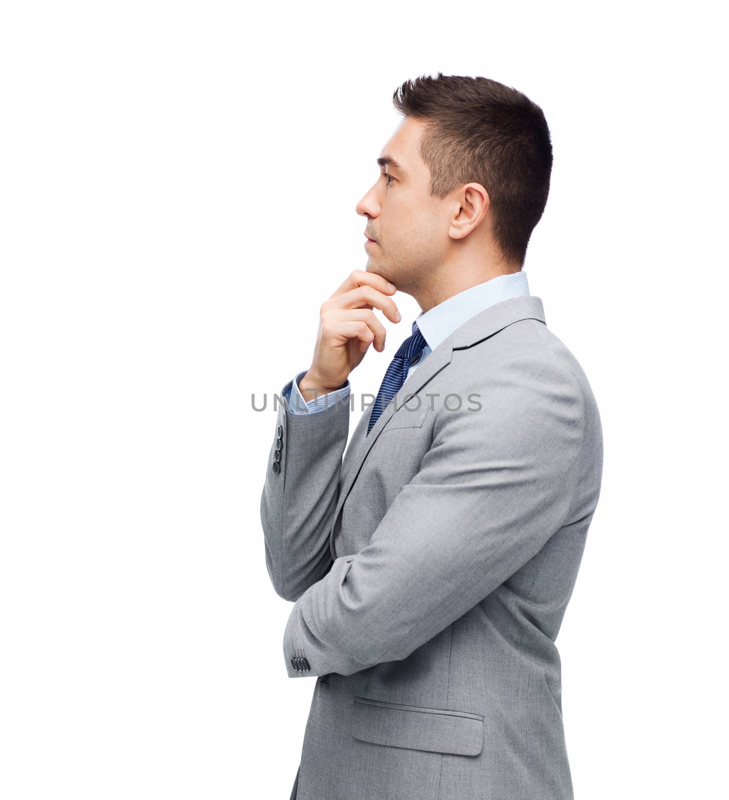 business, people and office concept - thinking businessman in suit making decision