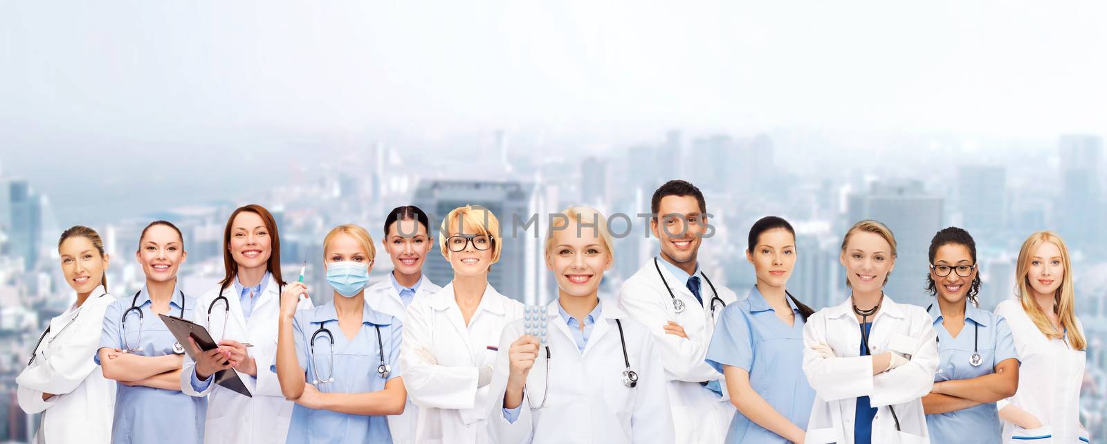 healthcare and medicine concept - smiling doctors and nurses with stethoscope