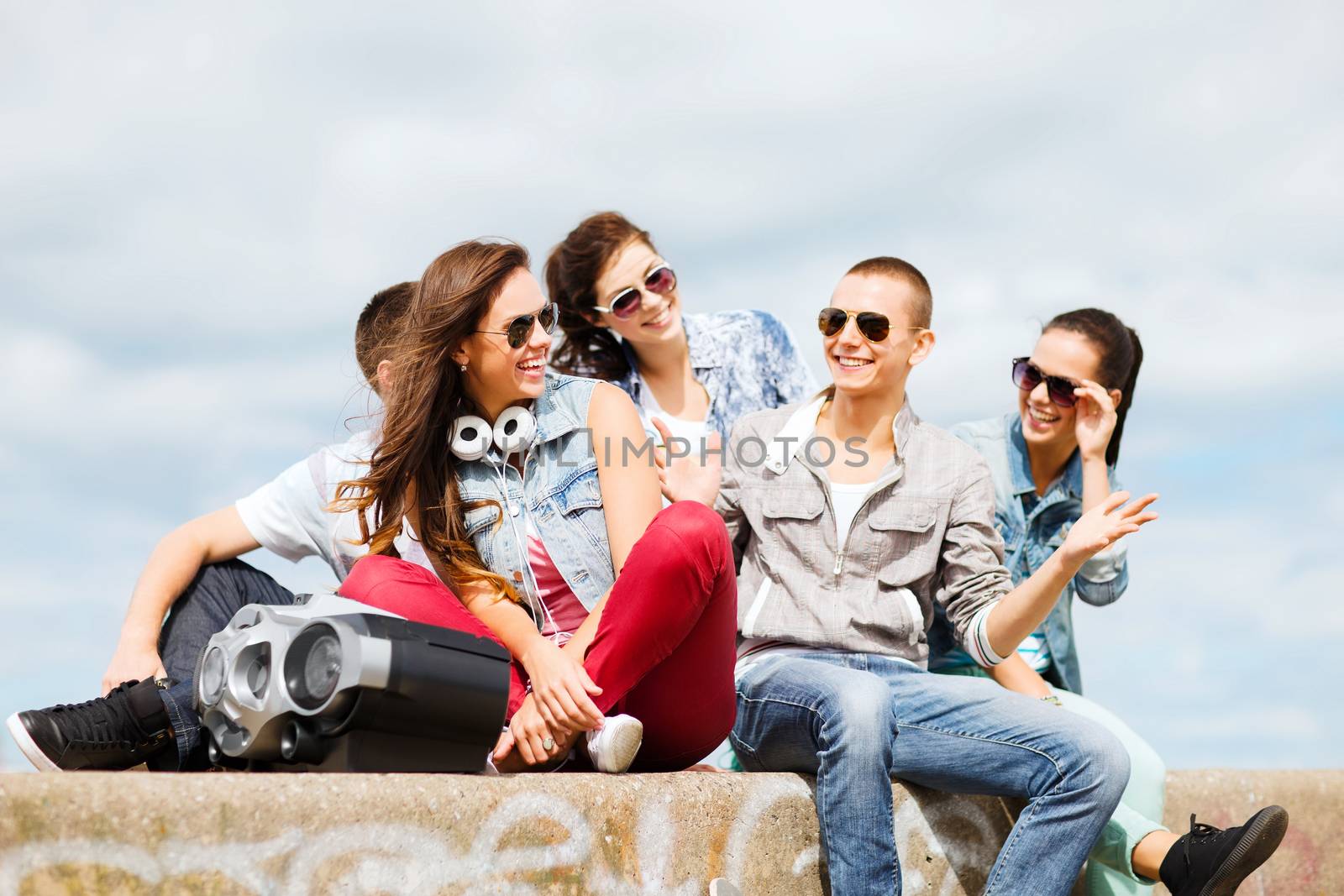 group of teenagers hanging out by dolgachov