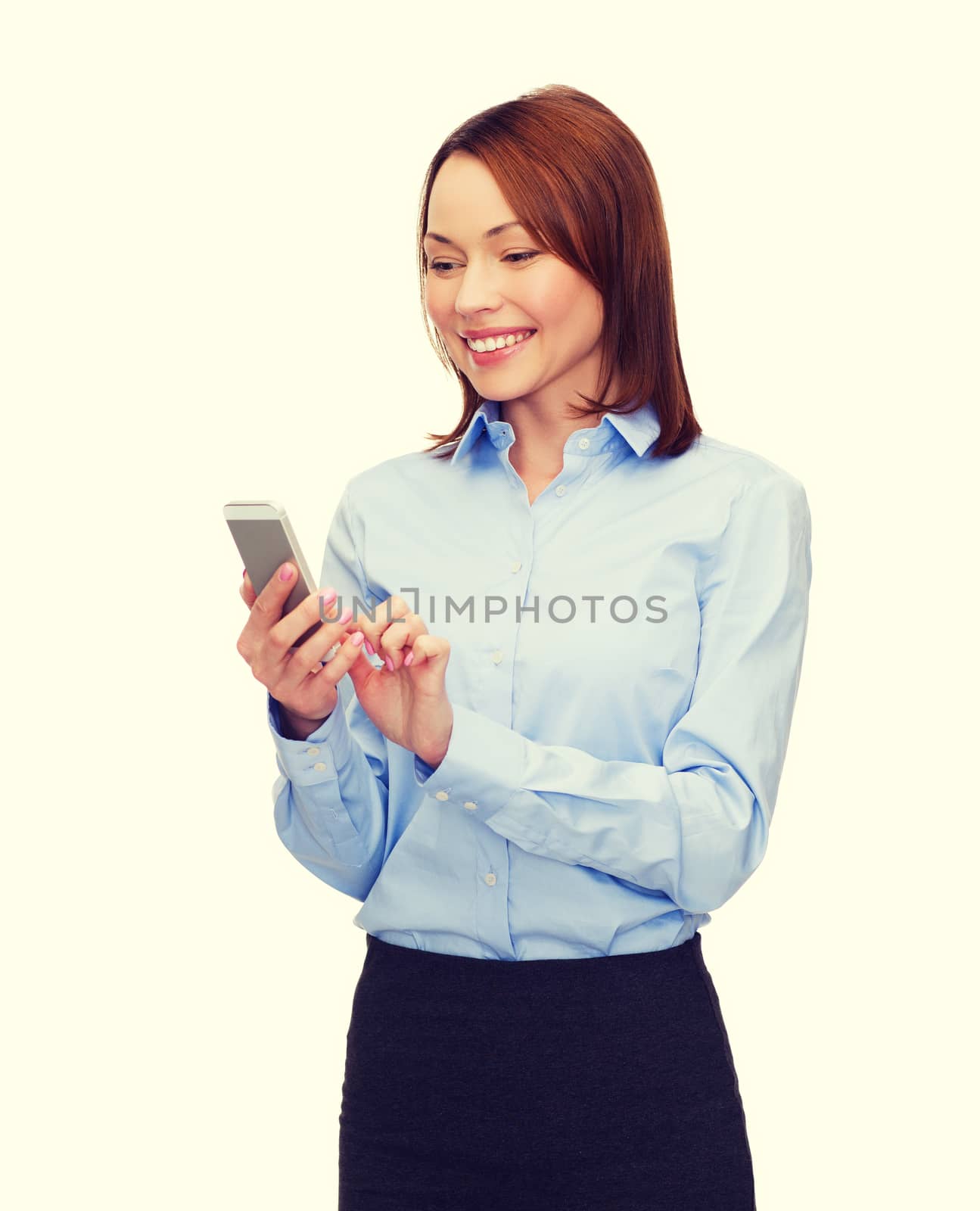 business, technology, internet and education concept - friendly young smiling businesswoman with smartphone