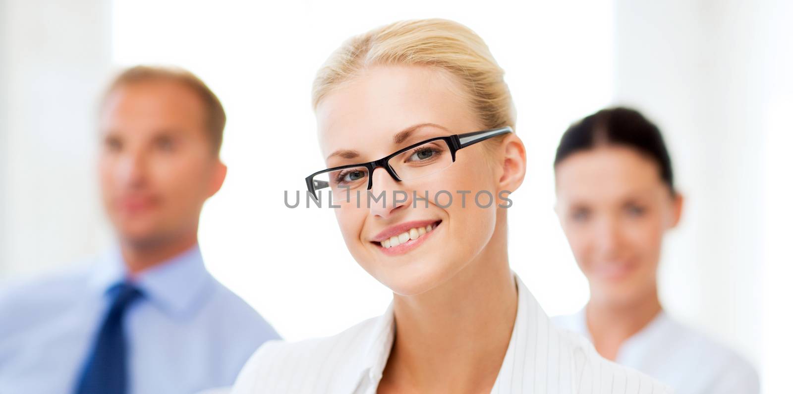 picture of smiling attractive businesswoman in office