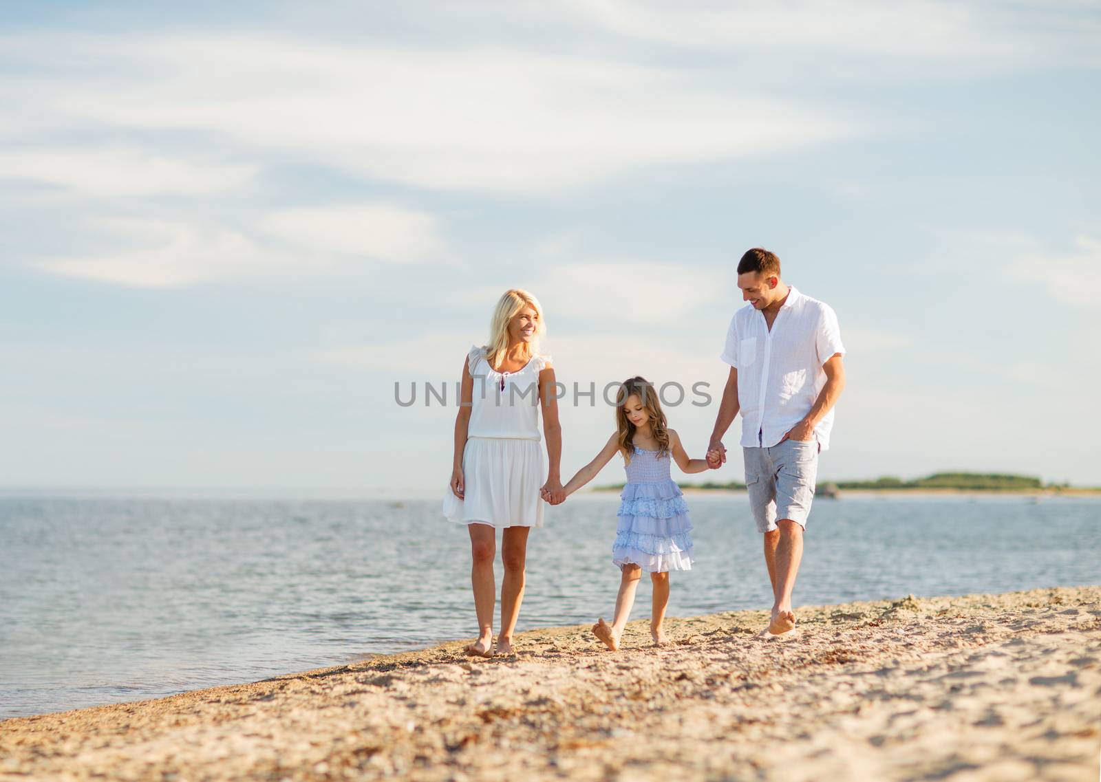 happy family at the seaside by dolgachov