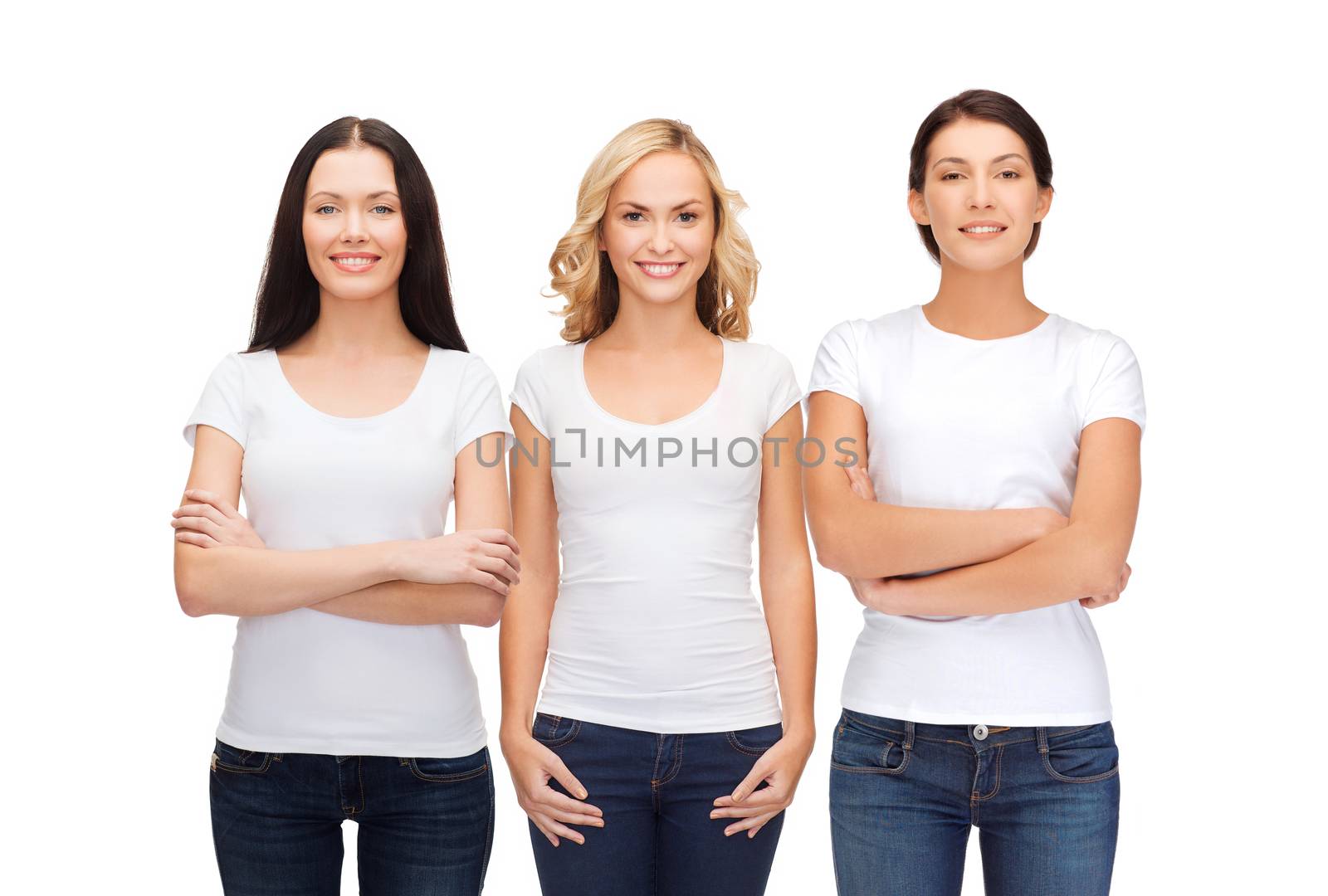 clothing design and people unity concept - group of happy smiling women in blank white t-shirts and jeans