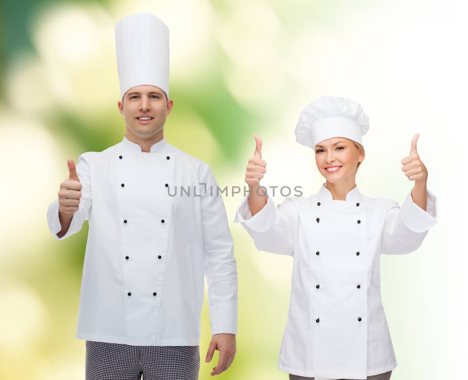 happy male chef cook showing thumbs up by dolgachov