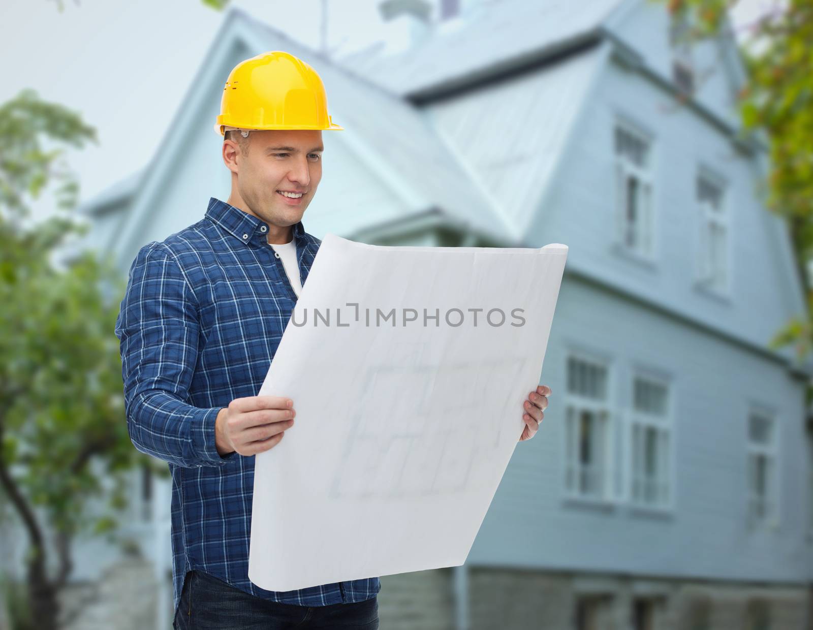 repair, construction, building, people and maintenance concept - smiling male builder or manual worker in helmet with blueprint over living house background