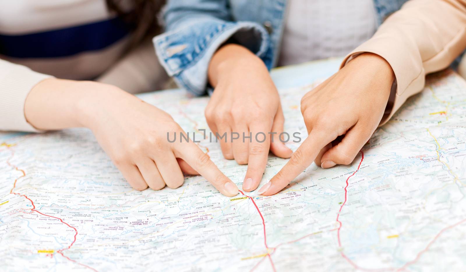 friends with tourist map in the city by dolgachov