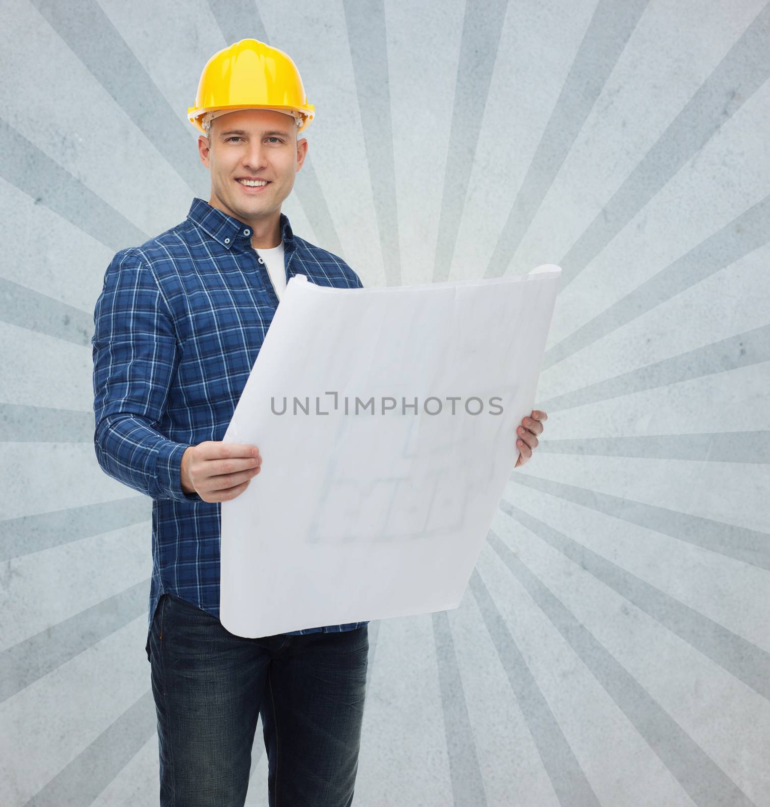 repair, construction, building, people and maintenance concept - smiling male builder or manual worker in helmet with blueprint over gray burst rays background