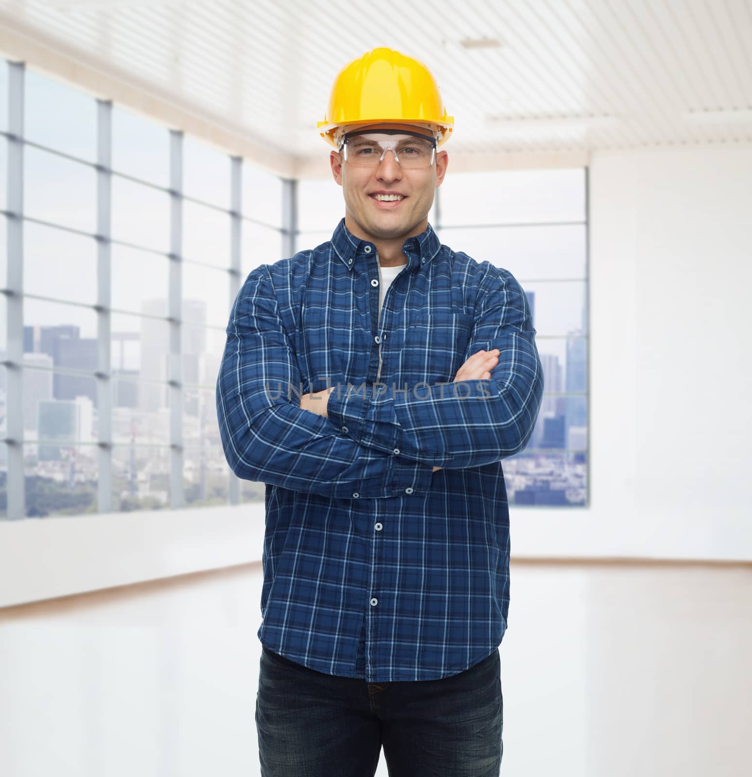 repair, construction, building, people and maintenance concept - smiling male builder or manual worker in helmet over empty flat background