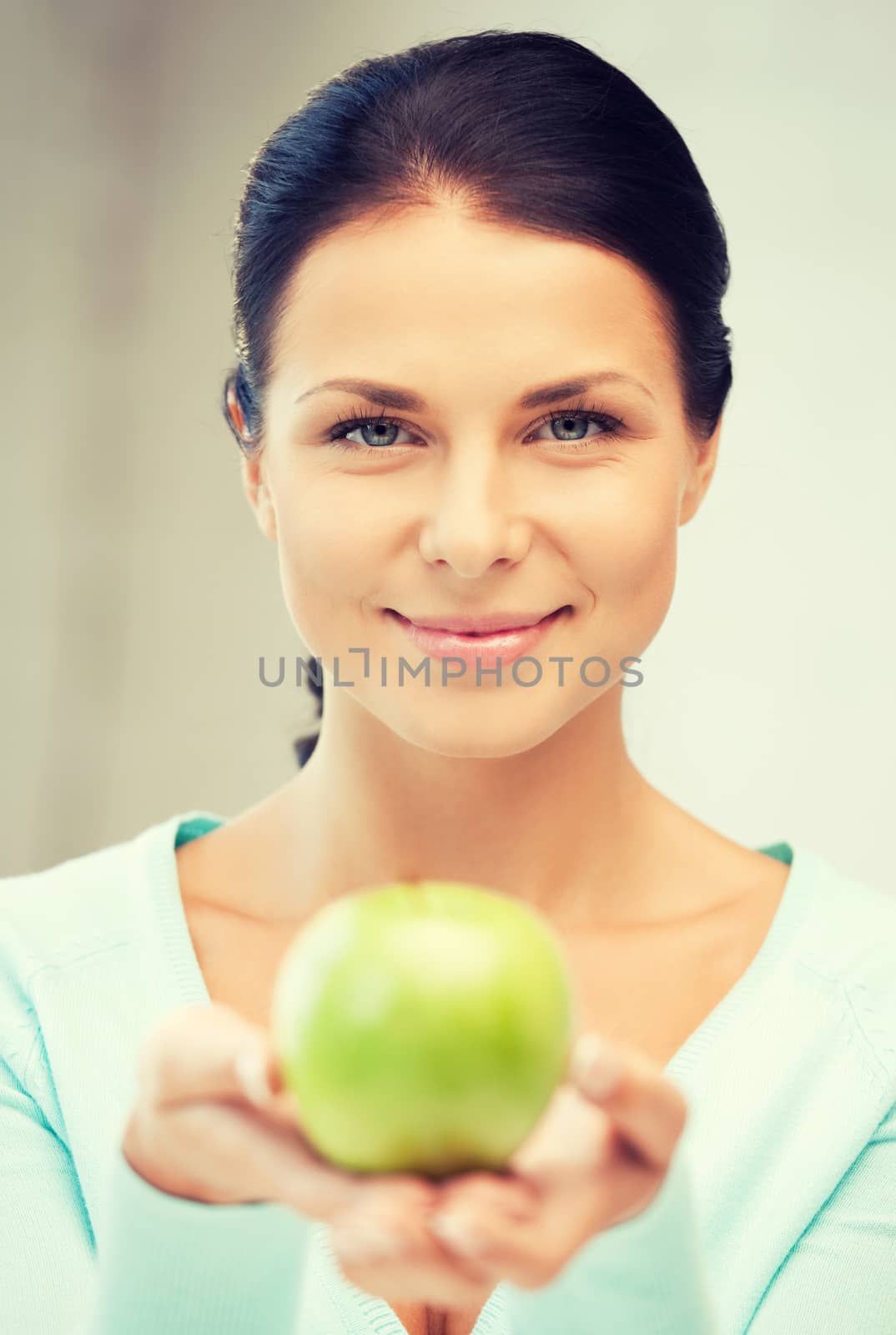 lovely housewife with green apple by dolgachov