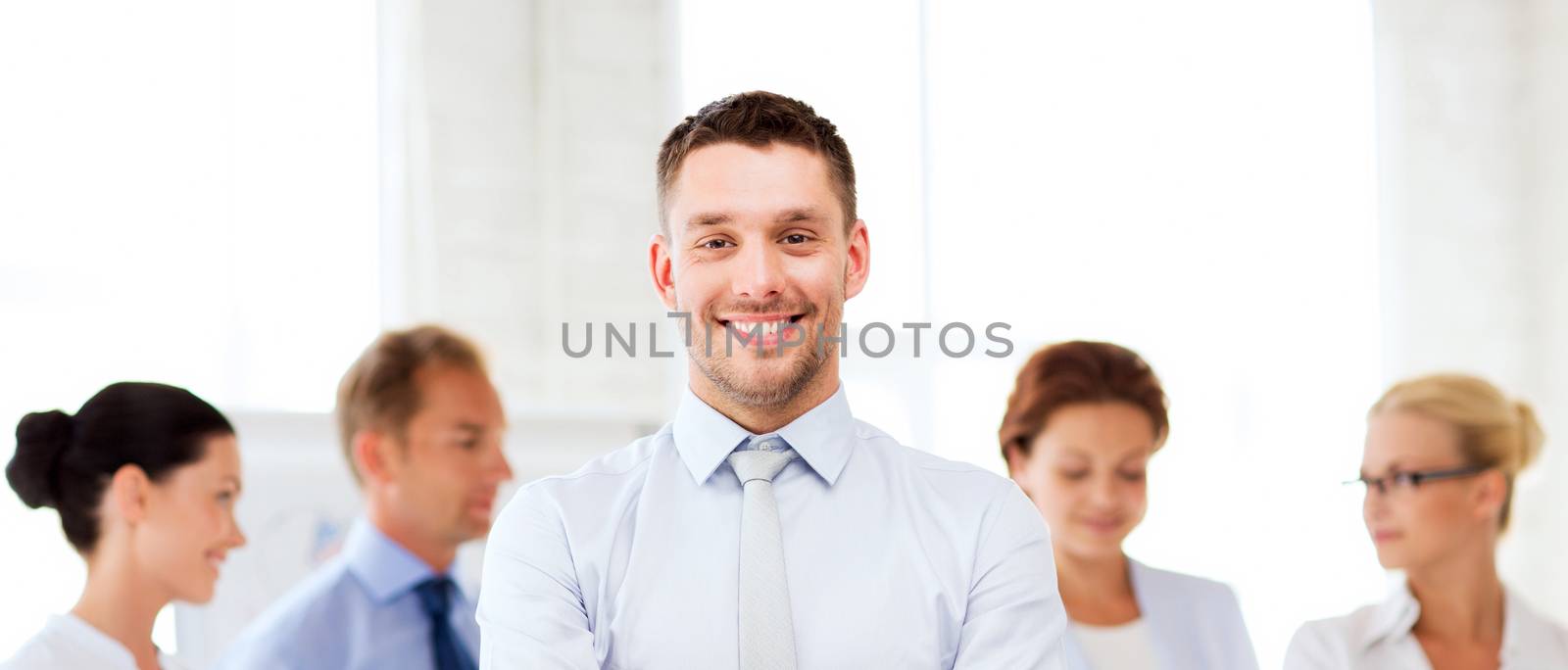 picture of smiling handsome businessman in office