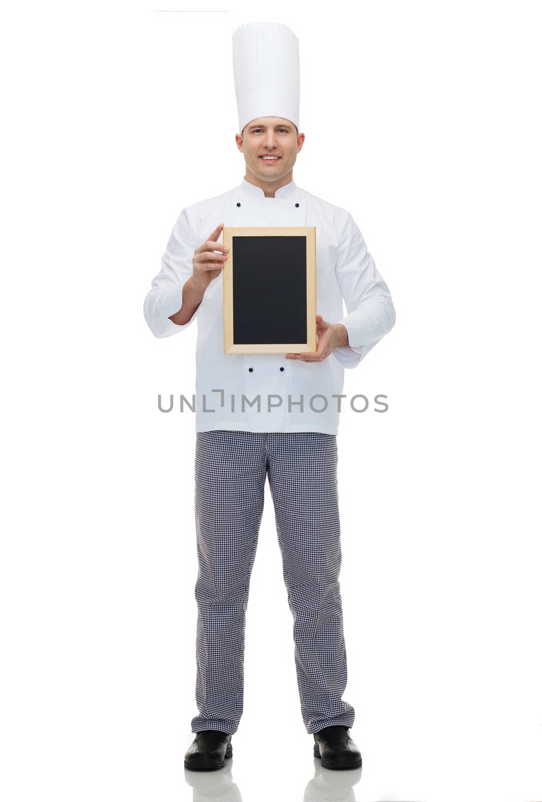 happy male chef cook holding blank menu board by dolgachov