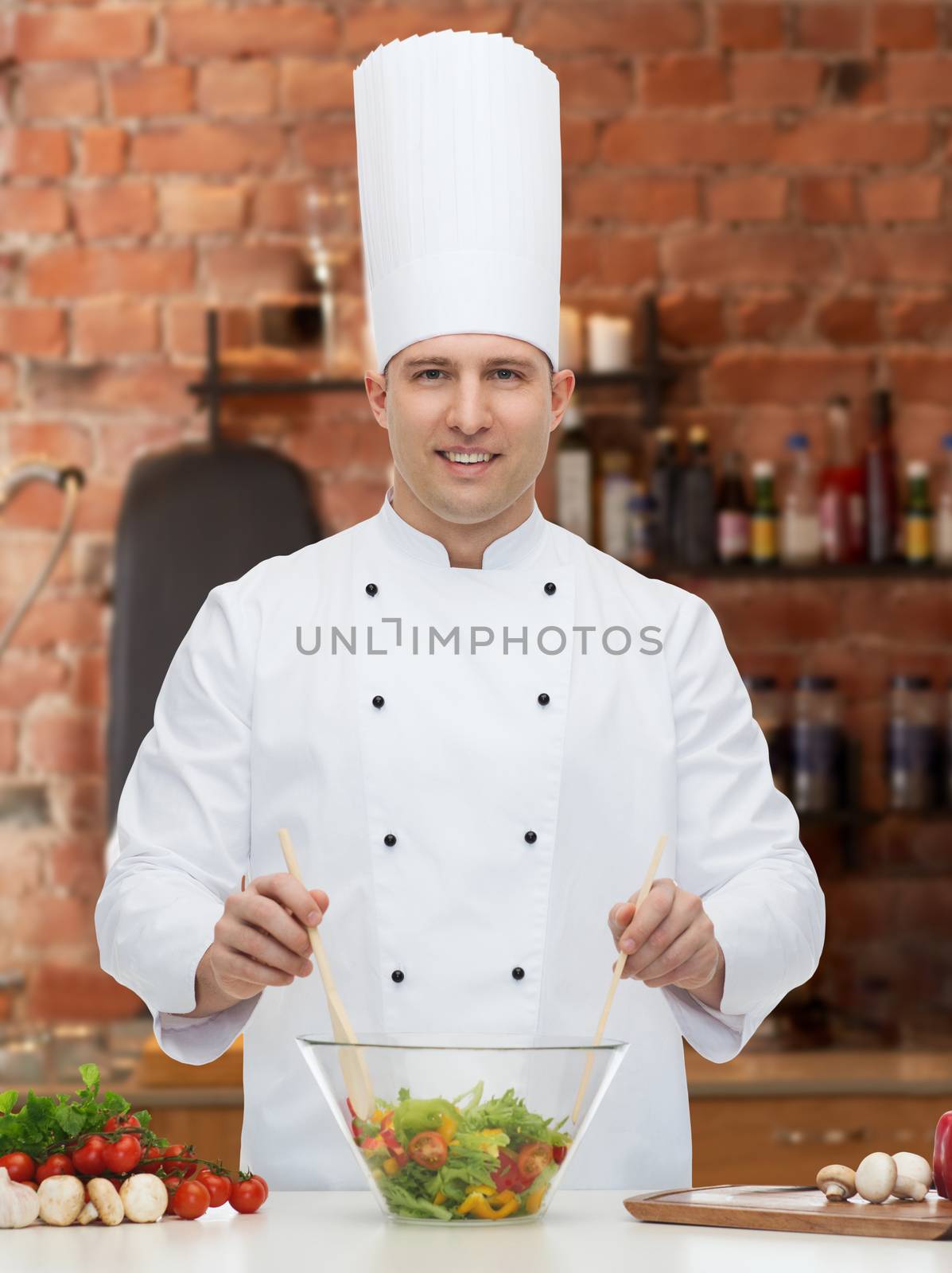 happy male chef cook cooking food by dolgachov