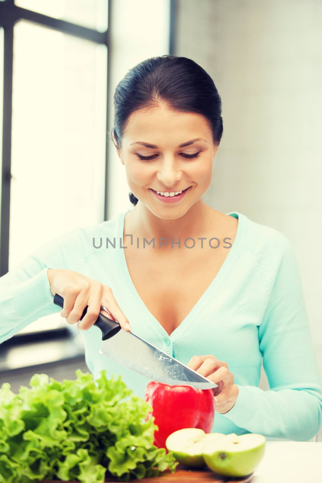 picture of beautiful woman in the kitchen.