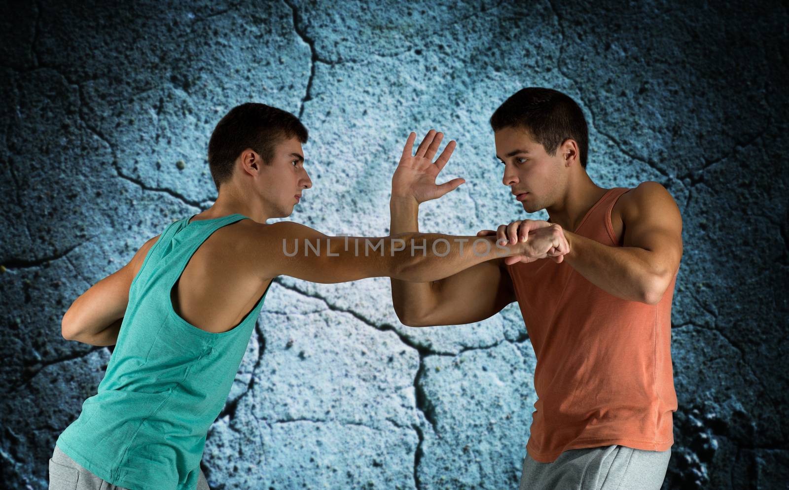 young men fighting hand-to-hand by dolgachov