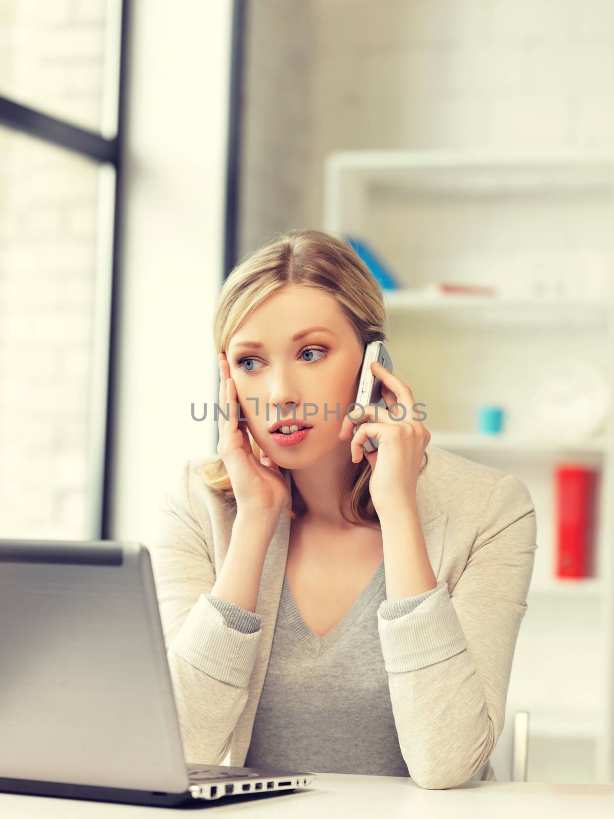 bright picture of businesswoman with cell phone