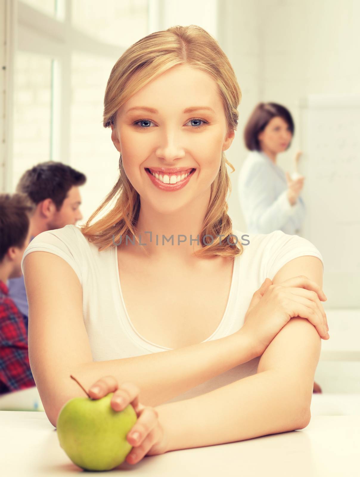 beautiful girl with green apple at school by dolgachov