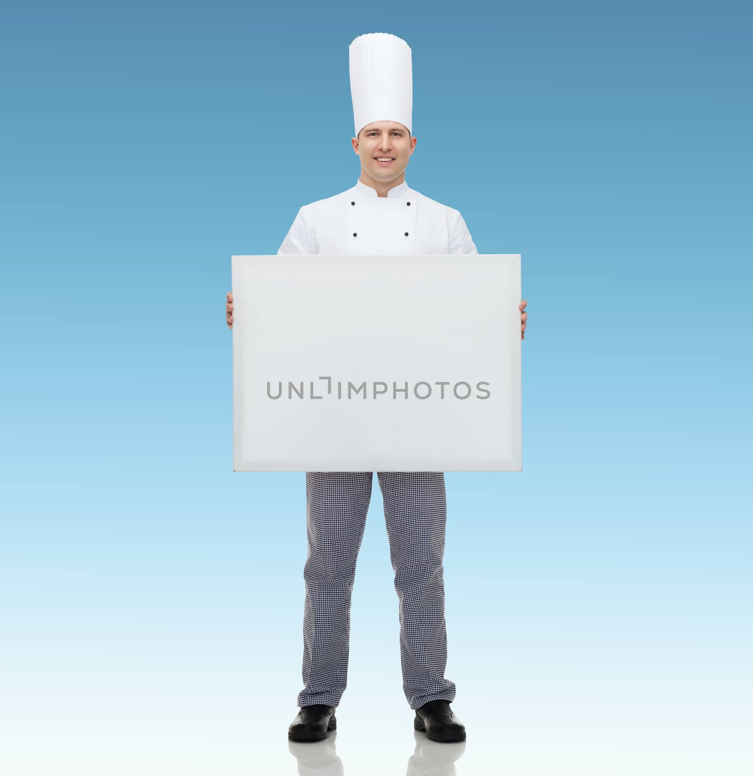 cooking, profession, advertisement and people concept - happy male chef cook holding and showing white blank big board over blue background