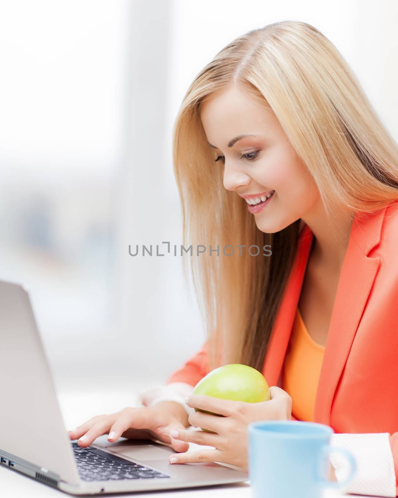 picture of smiling businesswoman with laptop computer