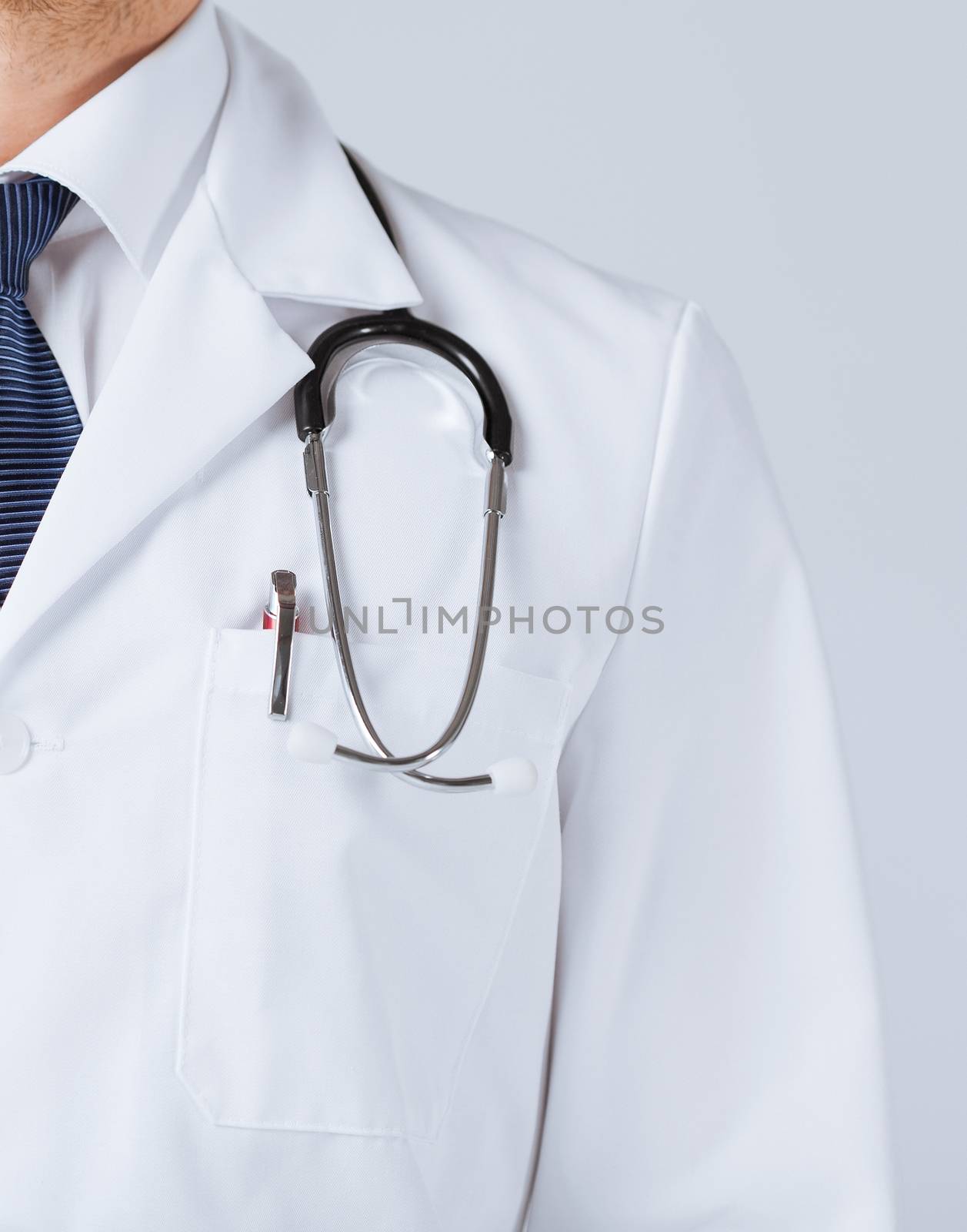 bright close up of male doctor with stethoscope