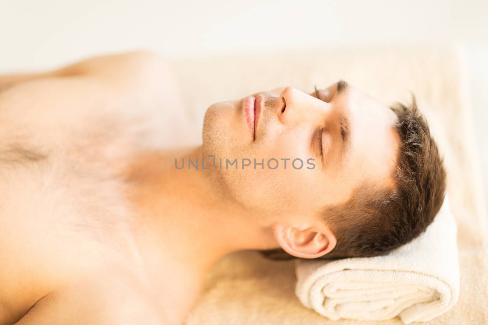 close up of man face in spa salon