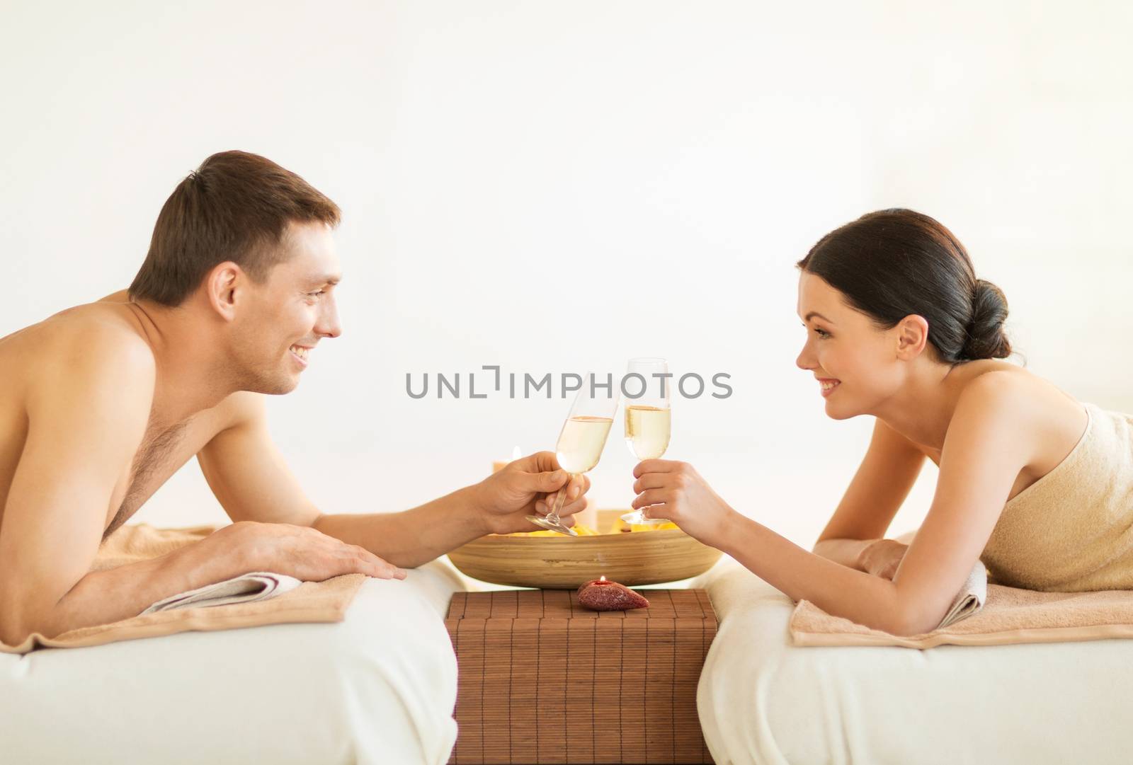 picture of couple in spa salon drinking champagne