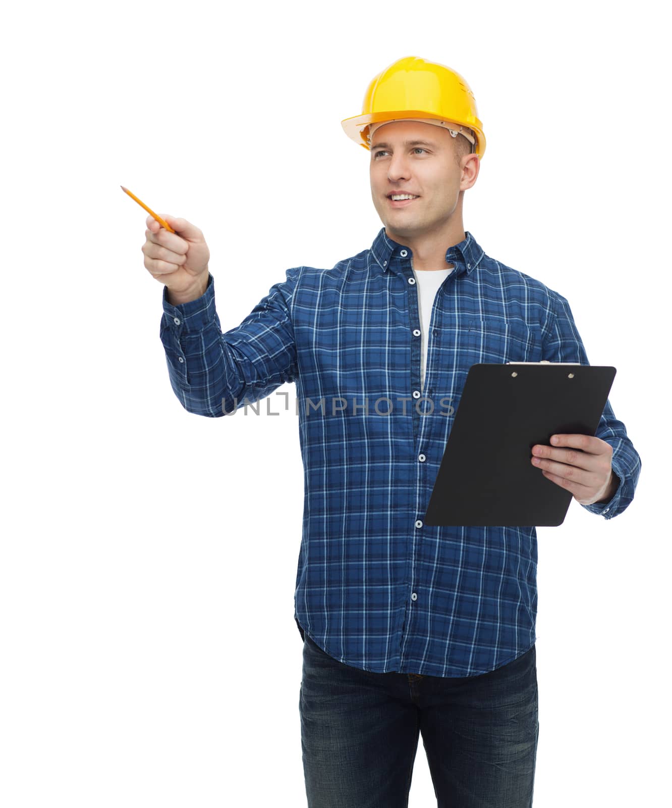 repair, building, construction and maintenance concept - smiling man or builder in helmet with clipboard pointing pencil