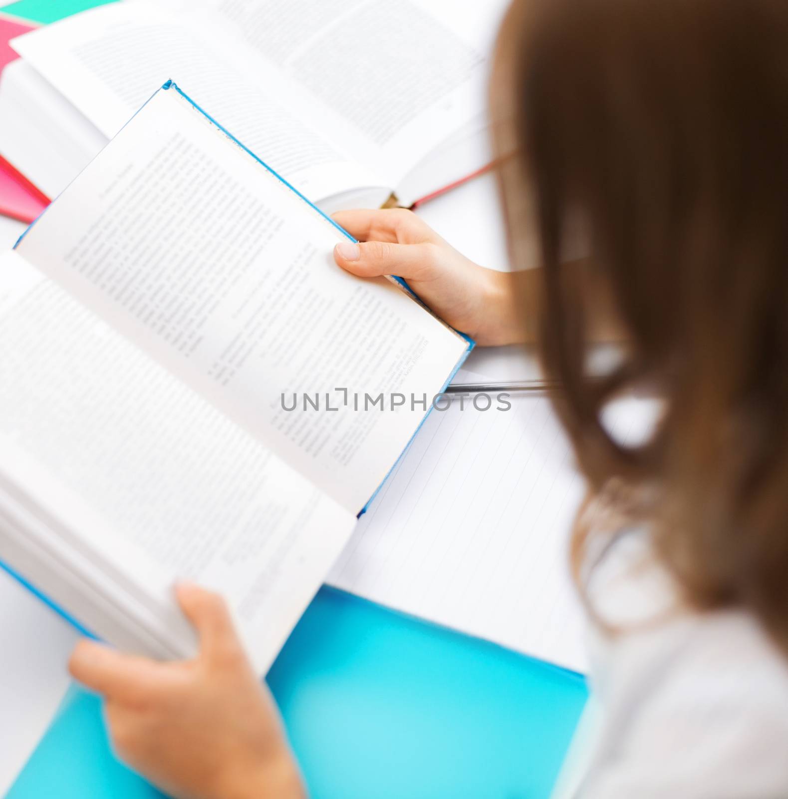 education, children and school concept - little student girl studying