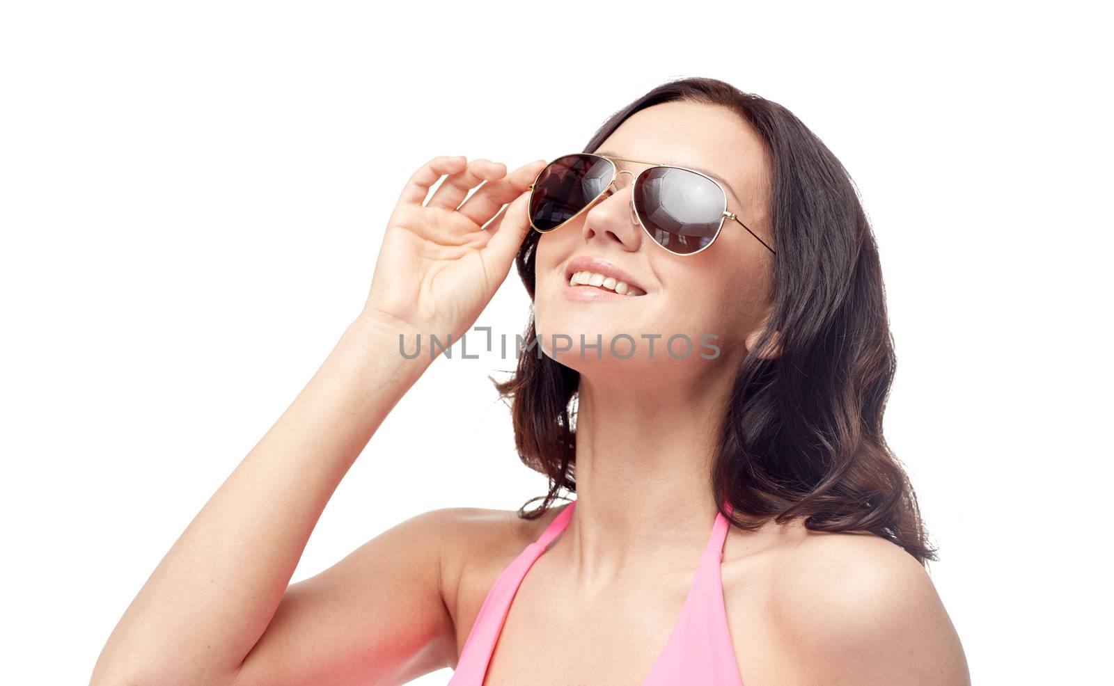 happy woman in sunglasses and swimsuit by dolgachov