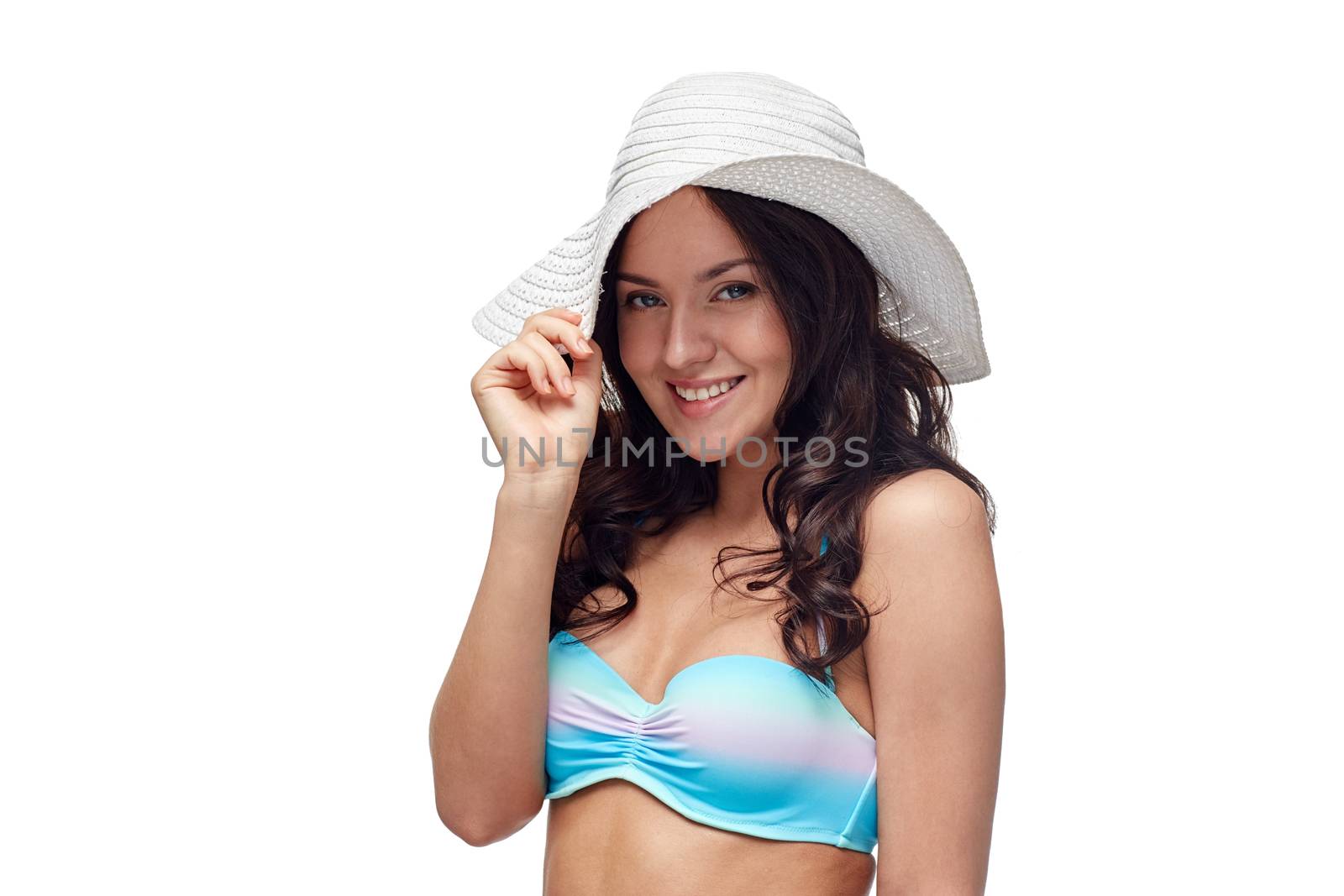 happy young woman in bikini swimsuit and sun hat by dolgachov