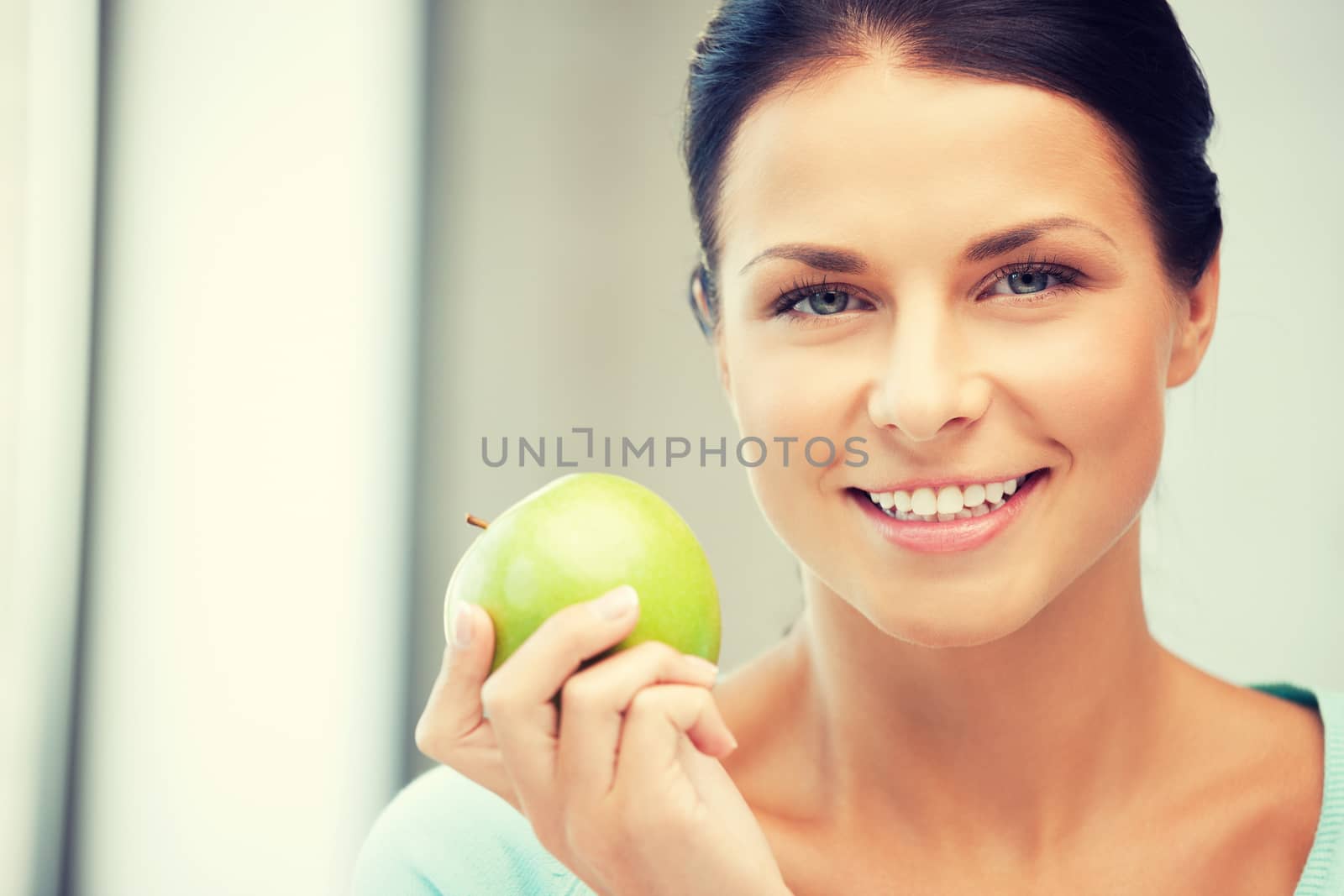 bright picture of lovely housewife with green apple