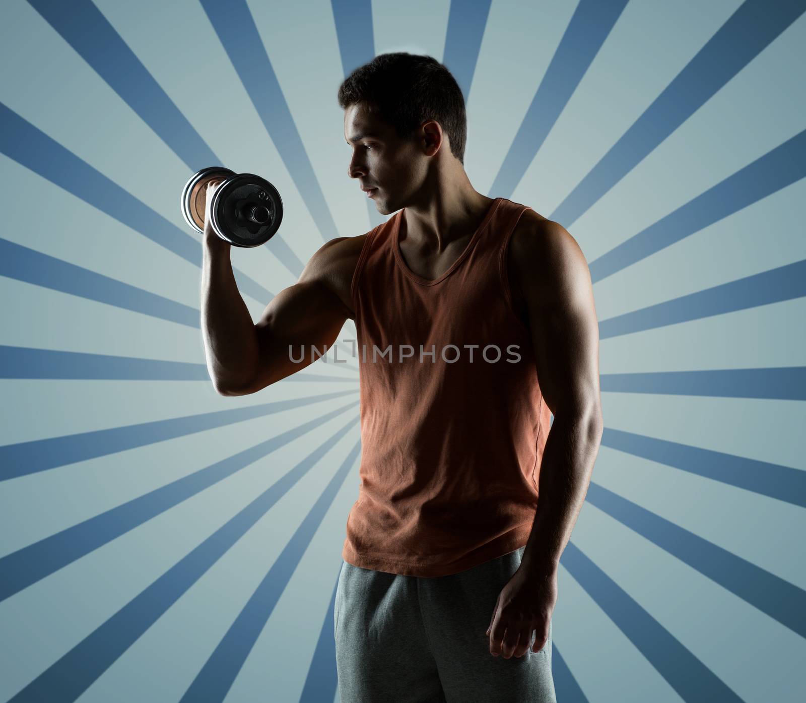 young man with dumbbell flexing biceps by dolgachov