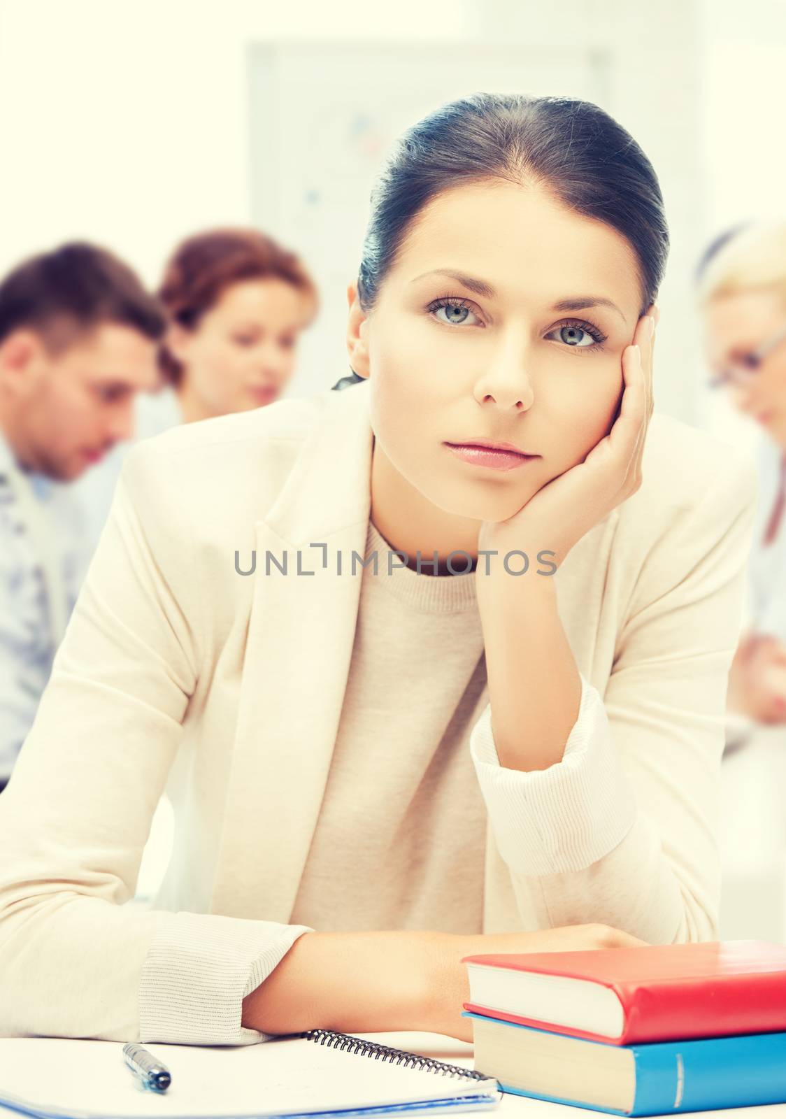 business and education concept - stressed businesswoman in office