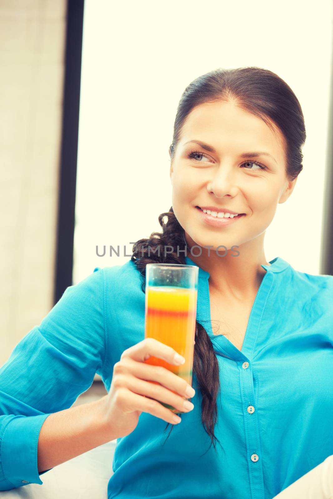 beautiful woman with glass of juice by dolgachov