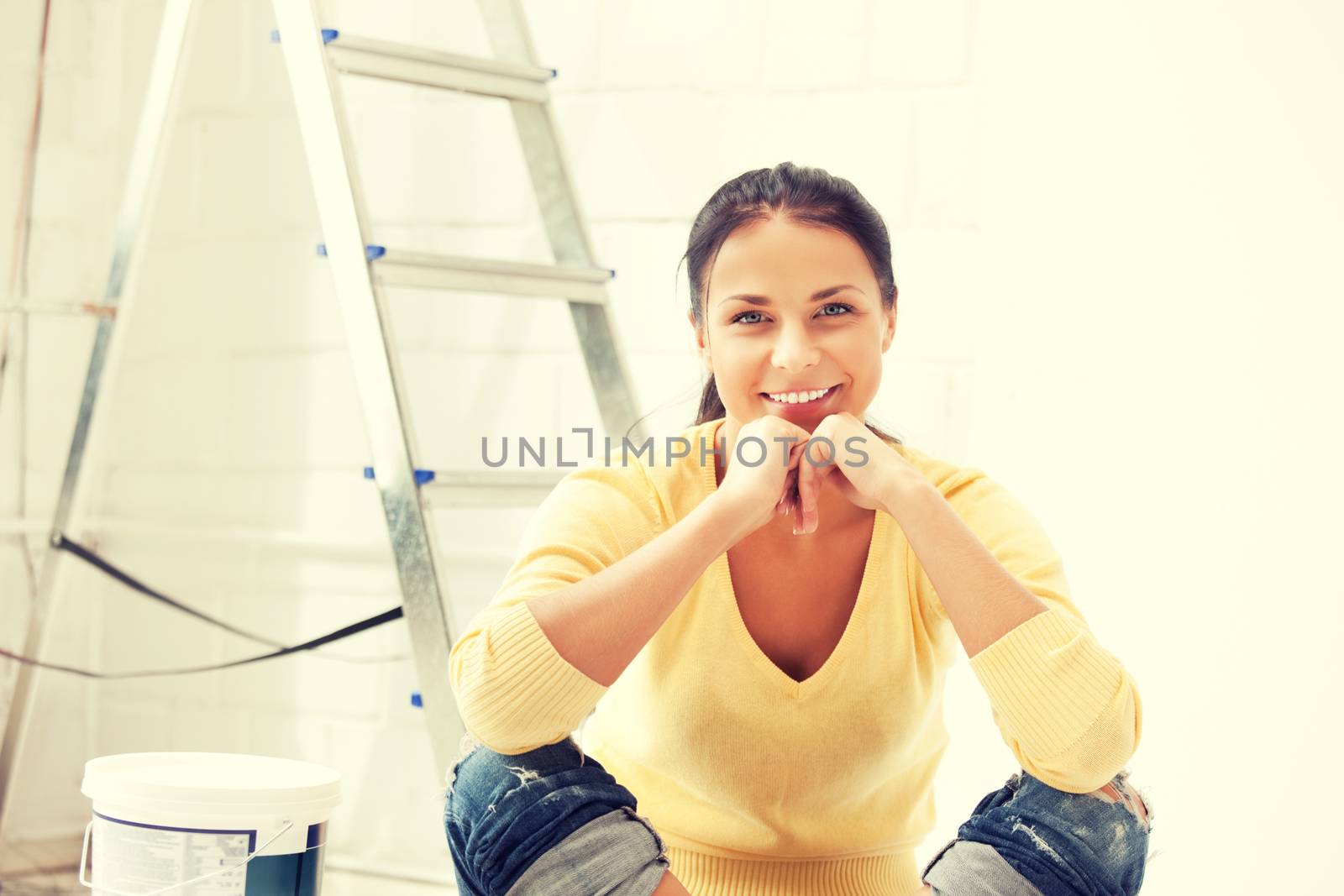 bright picture of lovely housewife making repairing works