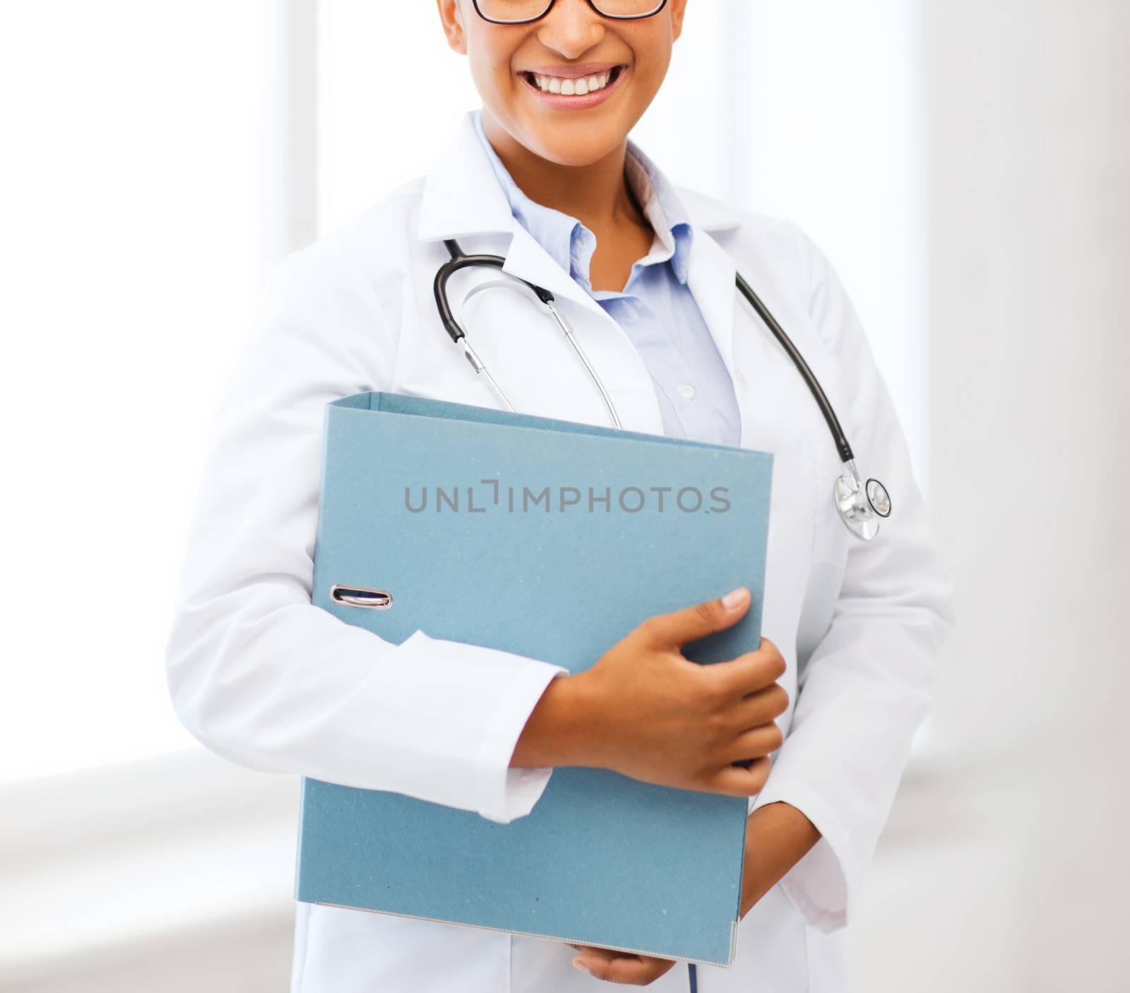 african female doctor in hospital by dolgachov