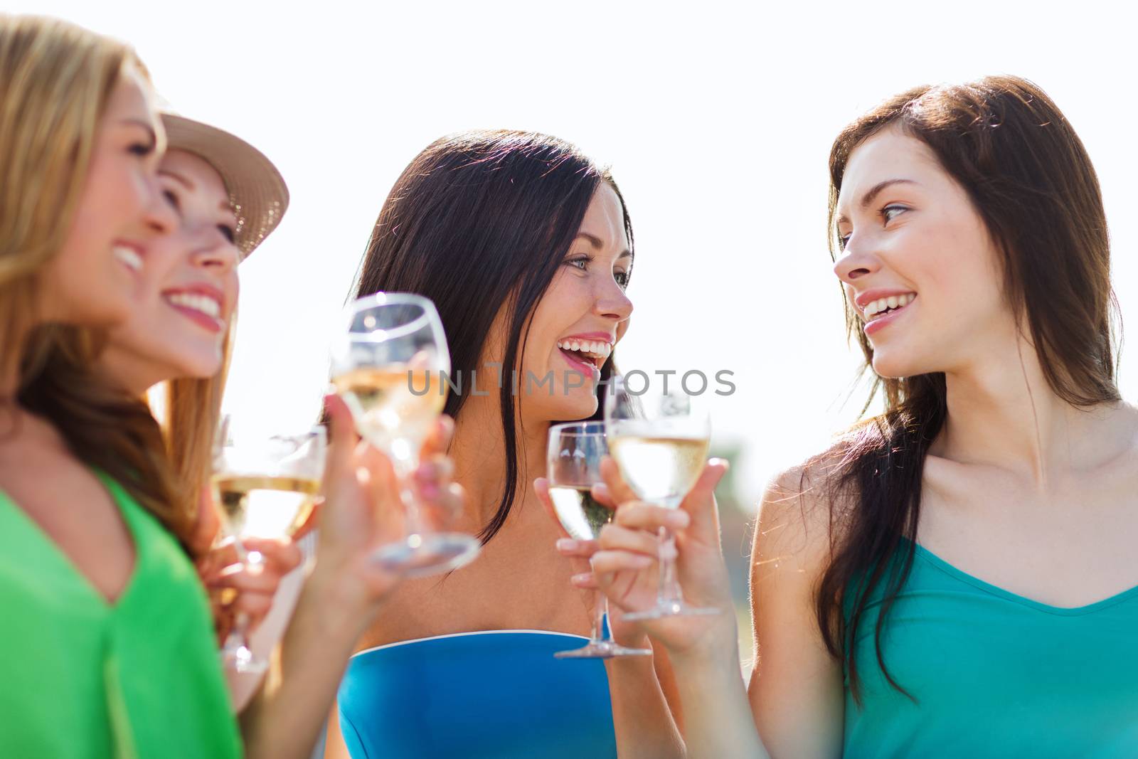 girls with champagne glasses by dolgachov
